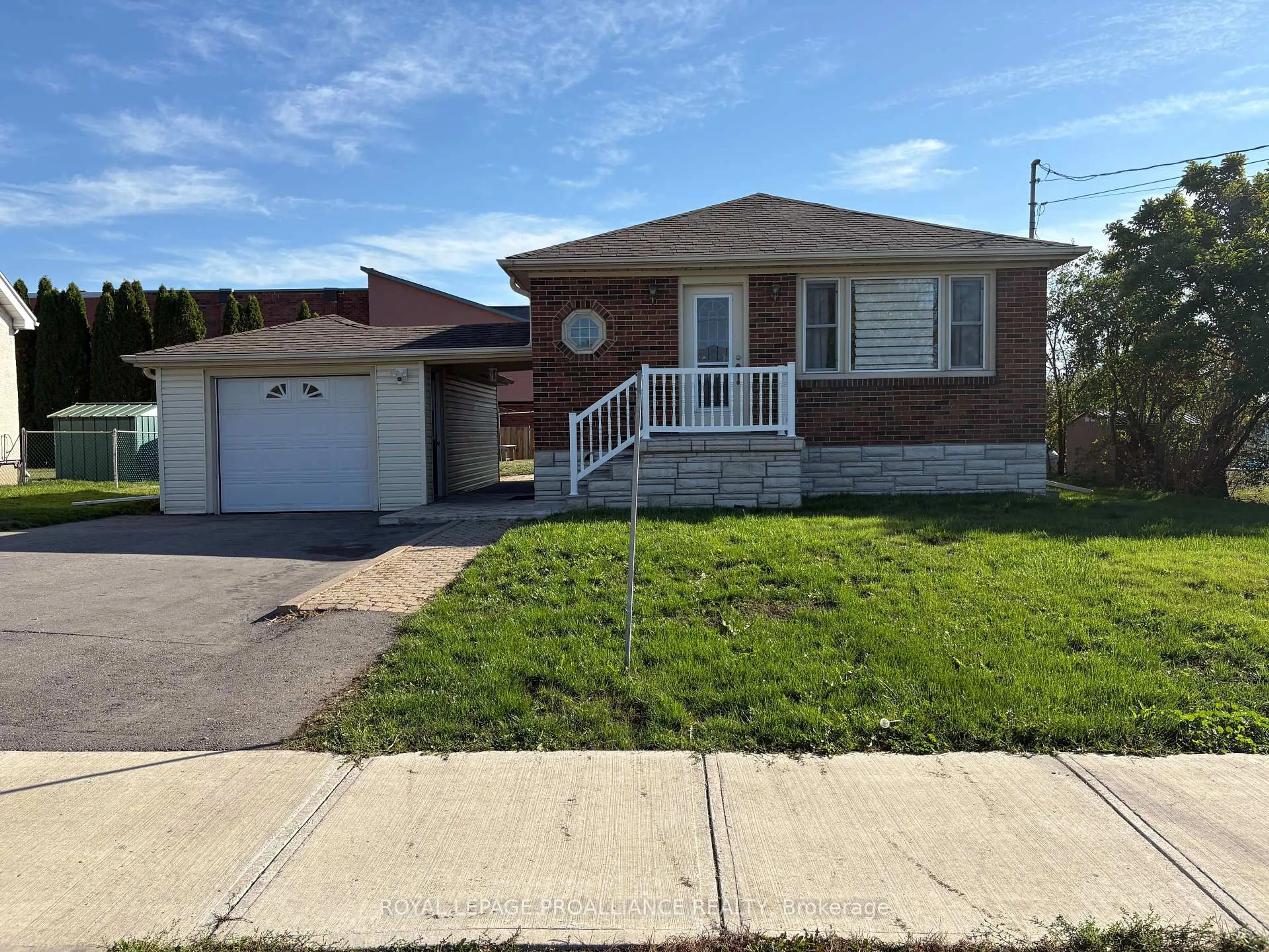 Home with brick exterior material, street for 18 Holmes Rd, Belleville Ontario K8P 4G6