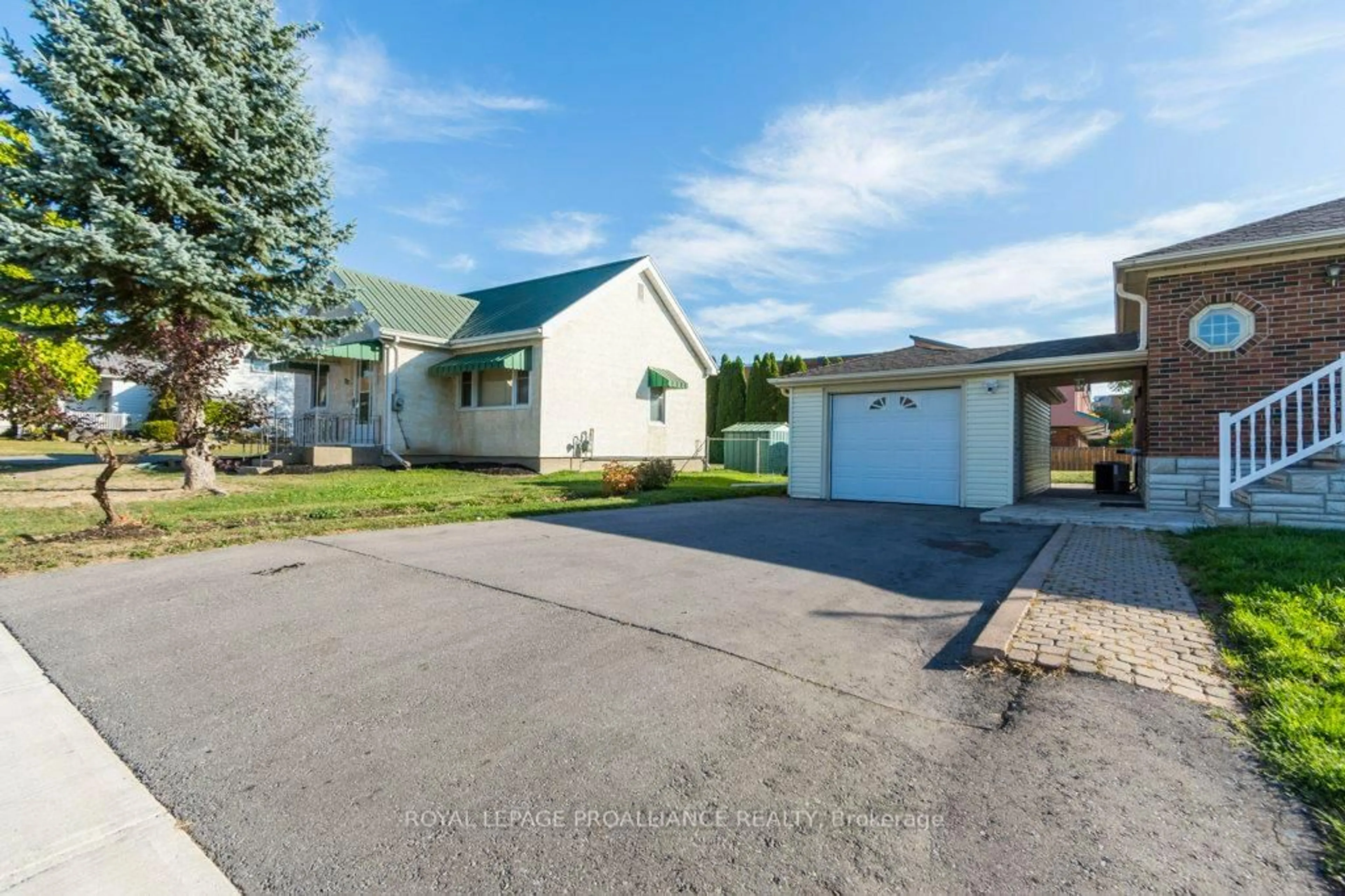 A pic from outside/outdoor area/front of a property/back of a property/a pic from drone, street for 18 Holmes Rd, Belleville Ontario K8P 4G6
