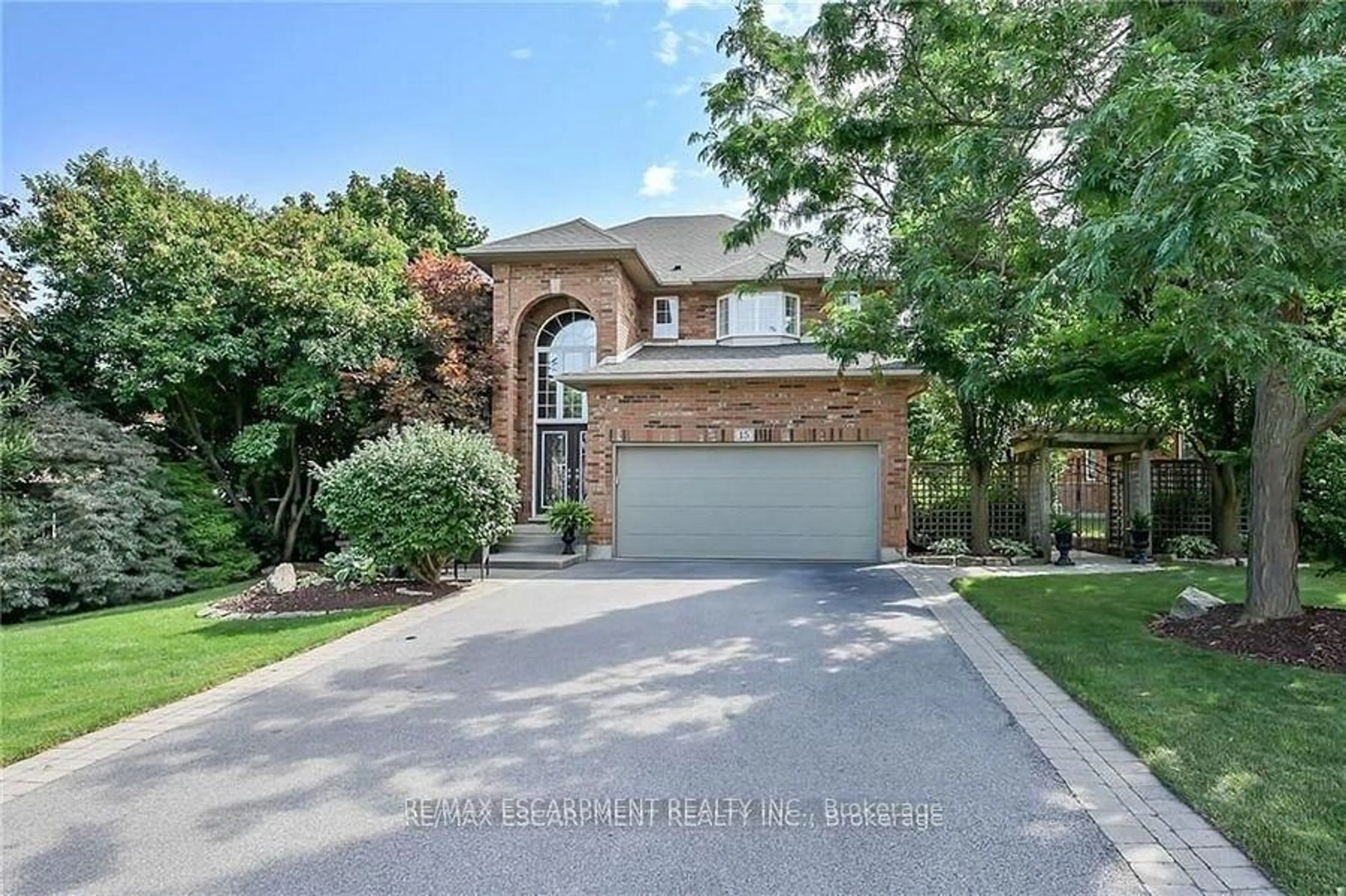 Home with brick exterior material, street for 15 Pelham Dr, Hamilton Ontario L9K 1L4