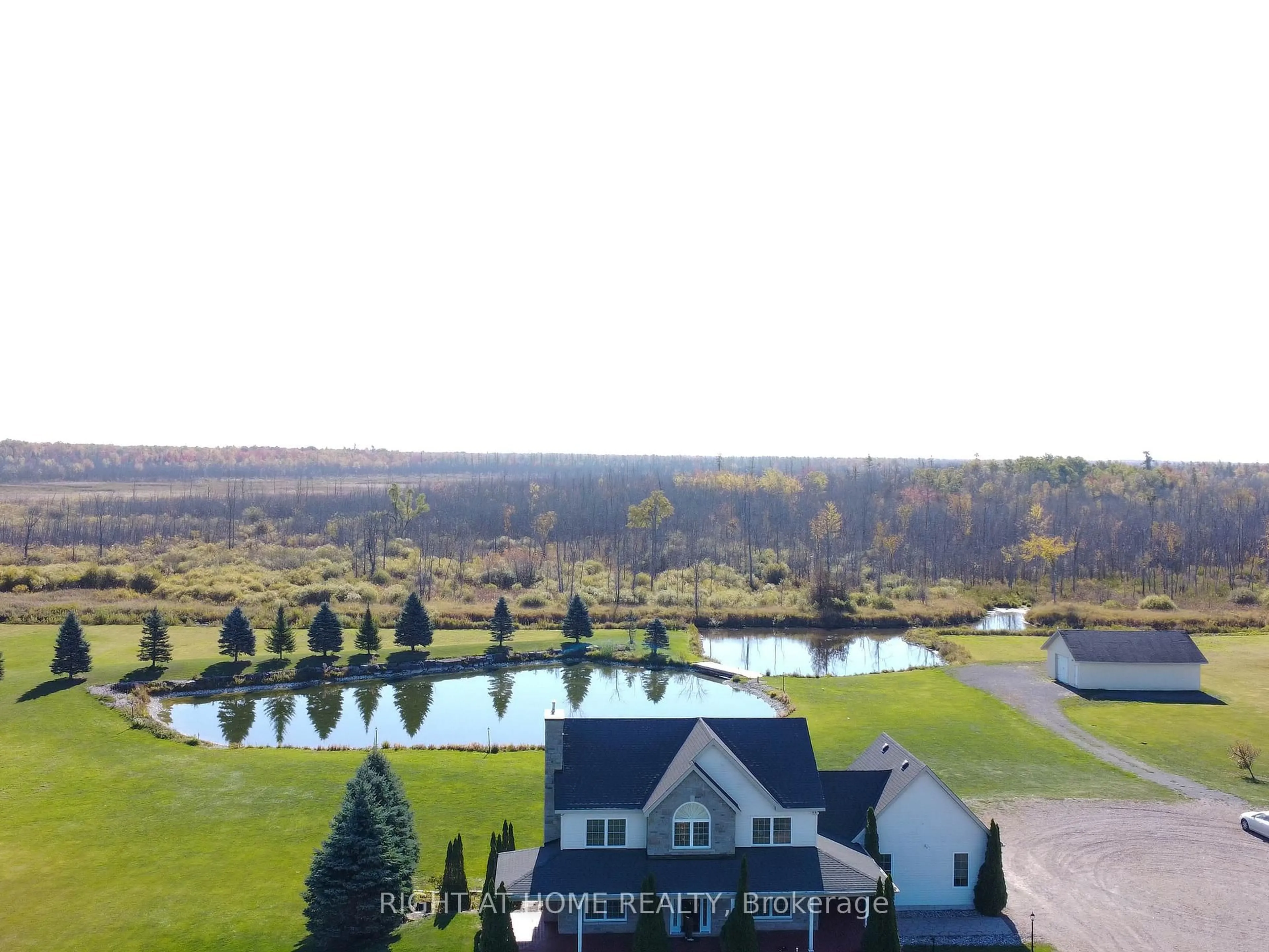 A pic from outside/outdoor area/front of a property/back of a property/a pic from drone, water/lake/river/ocean view for 1165 9TH Line, Carleton Place Ontario K7C 3P2