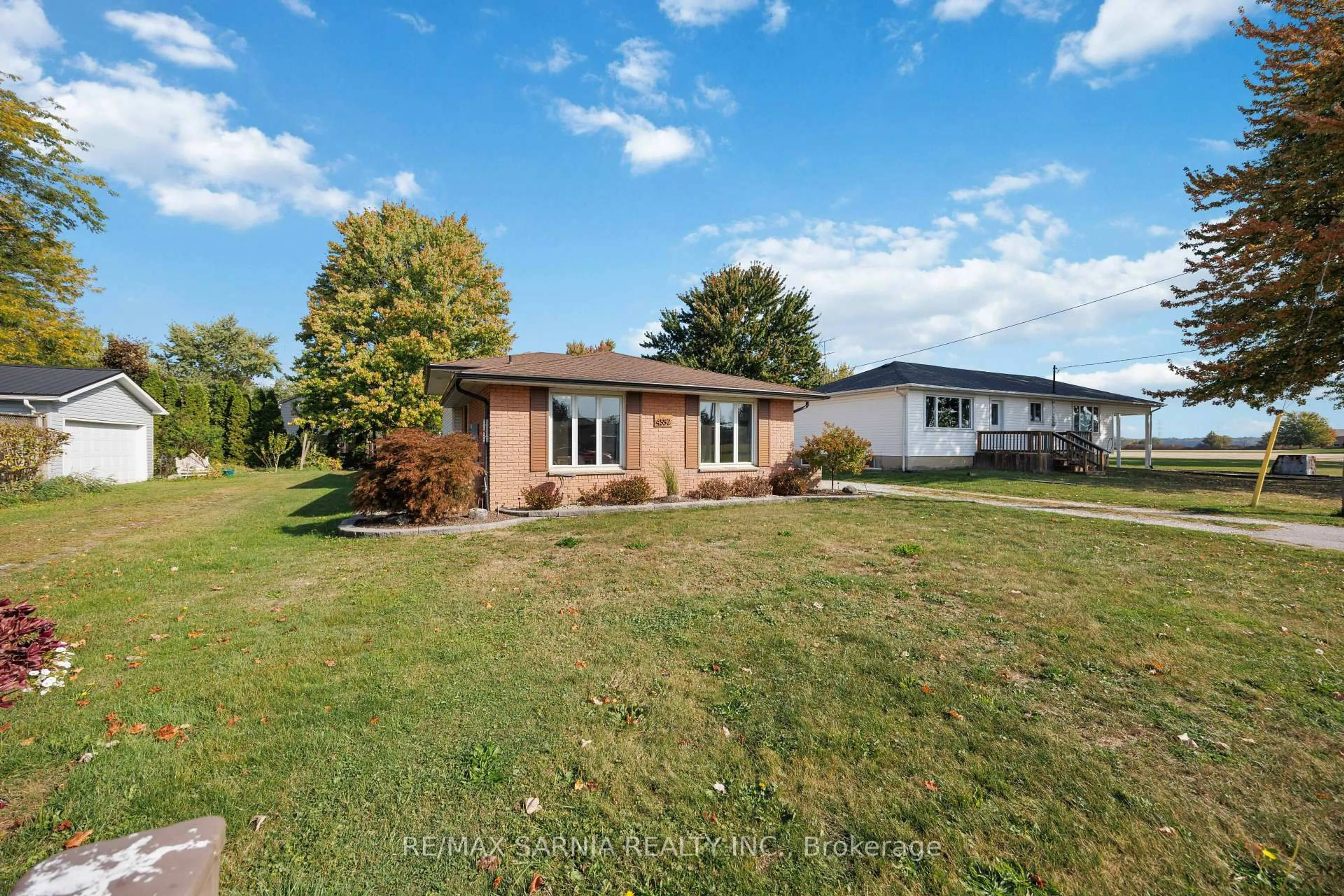 A pic from outside/outdoor area/front of a property/back of a property/a pic from drone, water/lake/river/ocean view for 4552 Shamrock St, Enniskillen Ontario N0N 1N0