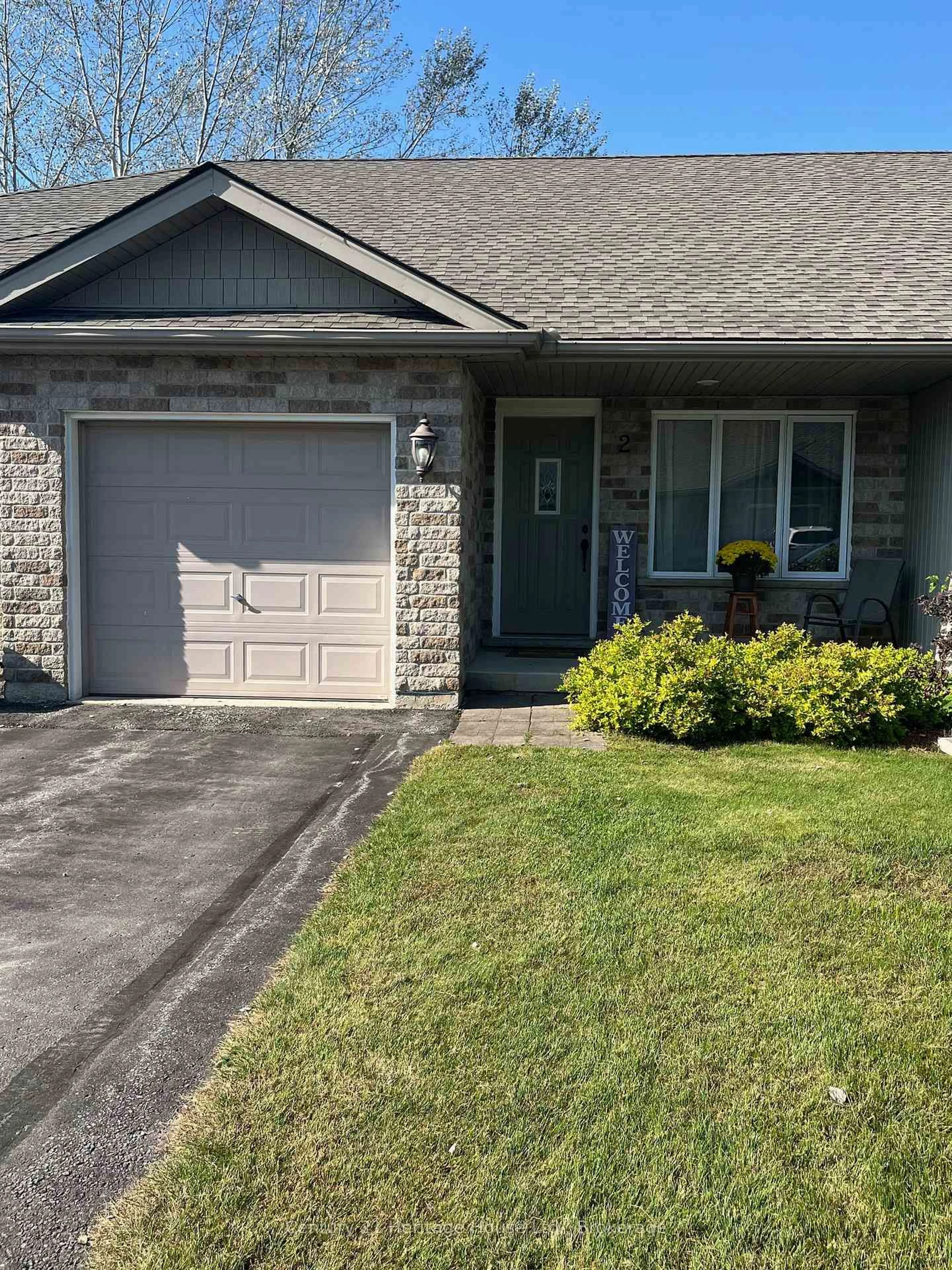 Home with vinyl exterior material, street for 2-302 Park St #2, West Grey Ontario N0G 1R0