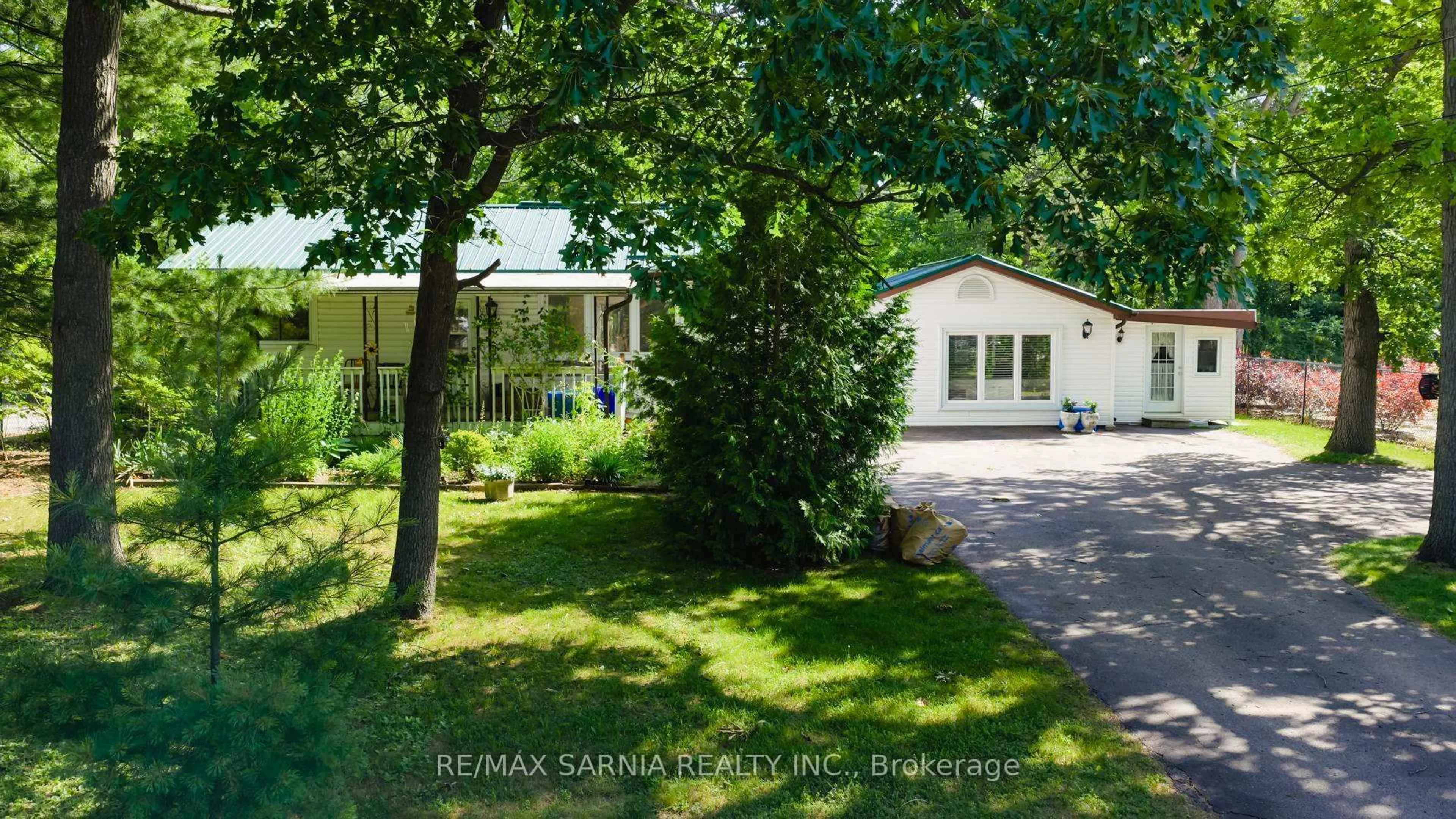 A pic from outside/outdoor area/front of a property/back of a property/a pic from drone, street for 10148 PORT FRANKS ESTATES Dr, Lambton Shores Ontario N0M 2L0