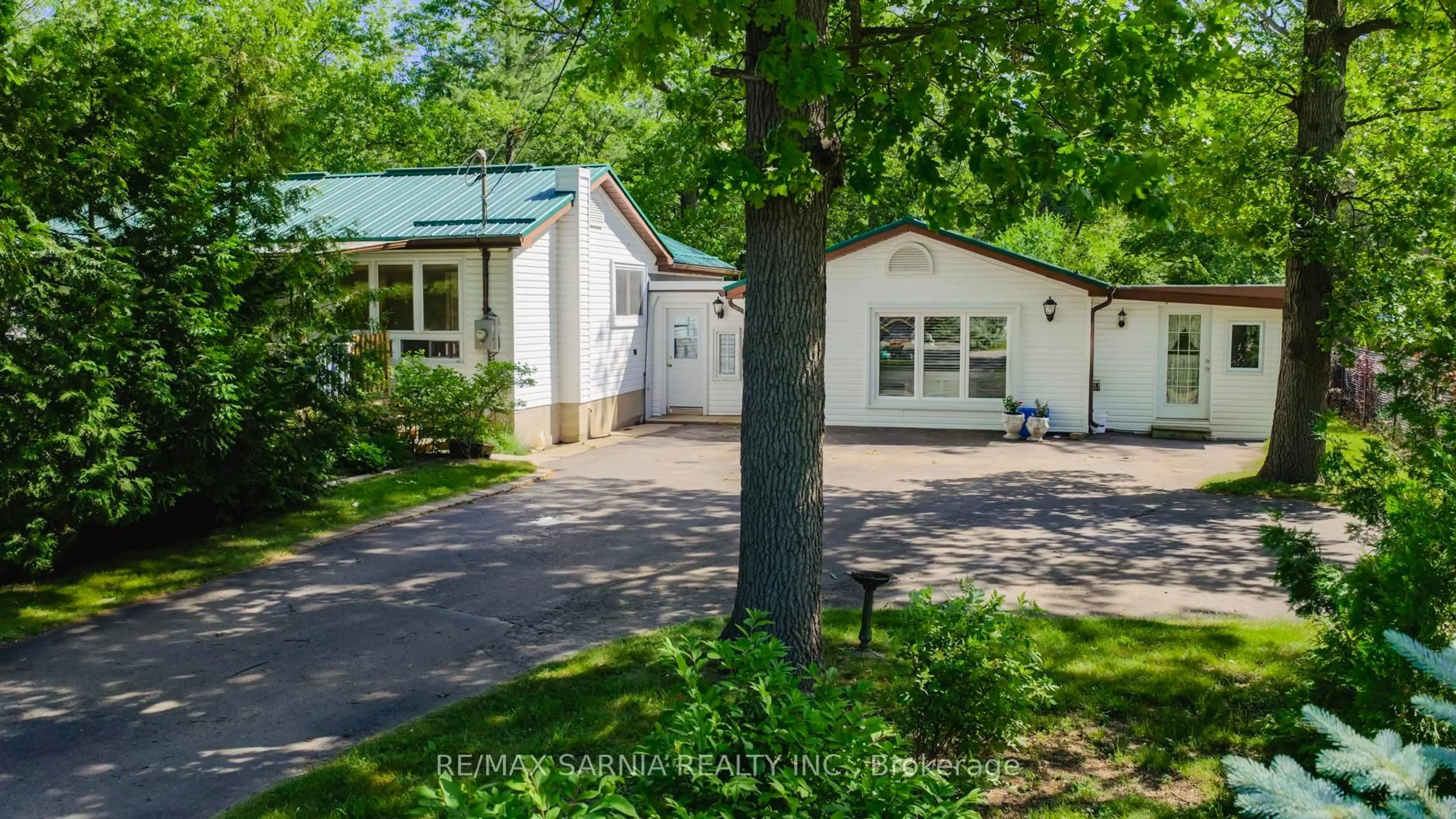A pic from outside/outdoor area/front of a property/back of a property/a pic from drone, street for 10148 PORT FRANKS ESTATES Dr, Lambton Shores Ontario N0M 2L0