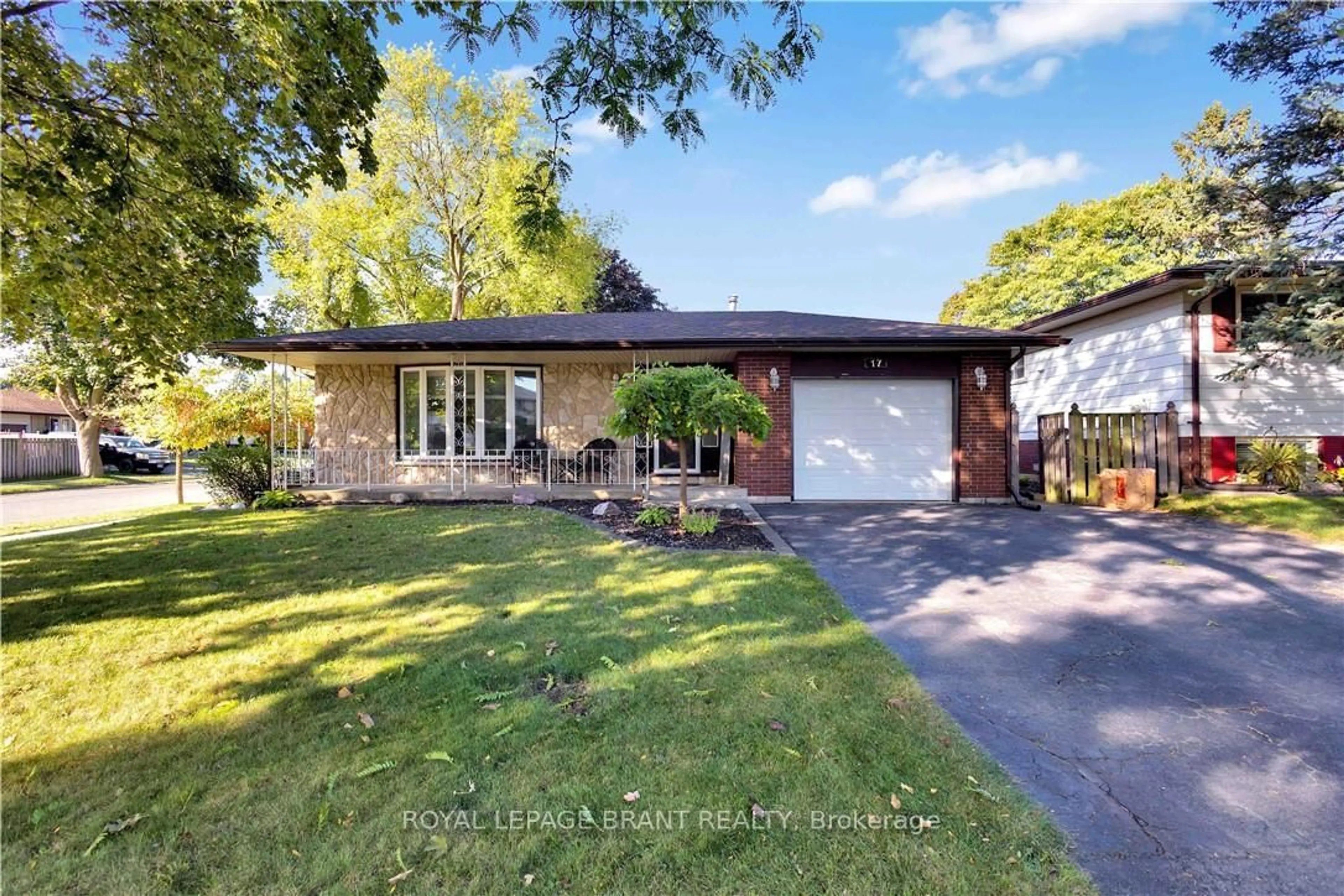 Home with brick exterior material, street for 17 Penny Lane, Brantford Ontario N3R 5Y5