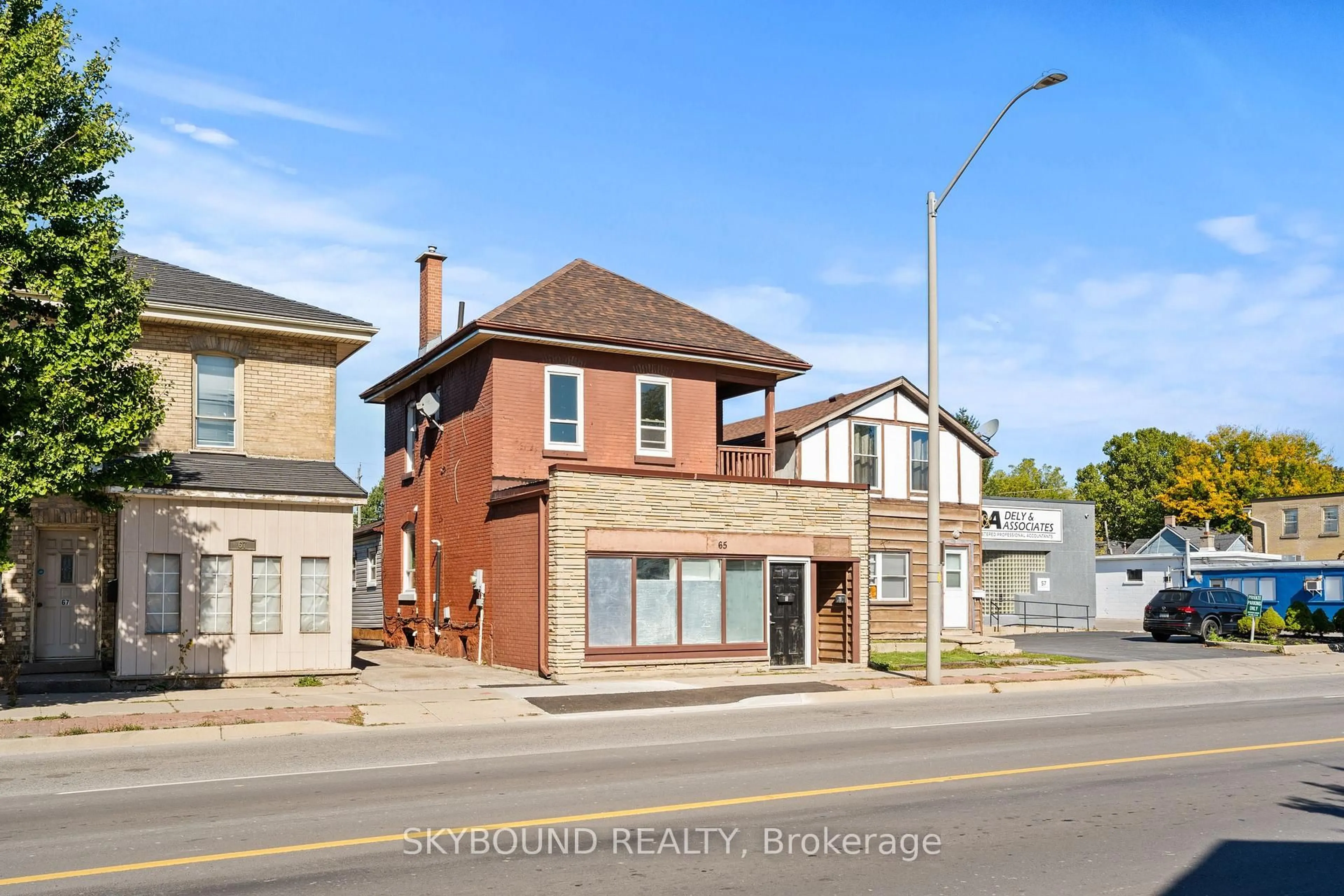 Home with brick exterior material, street for 65 Colborne St, Brant Ontario N3T 1K6