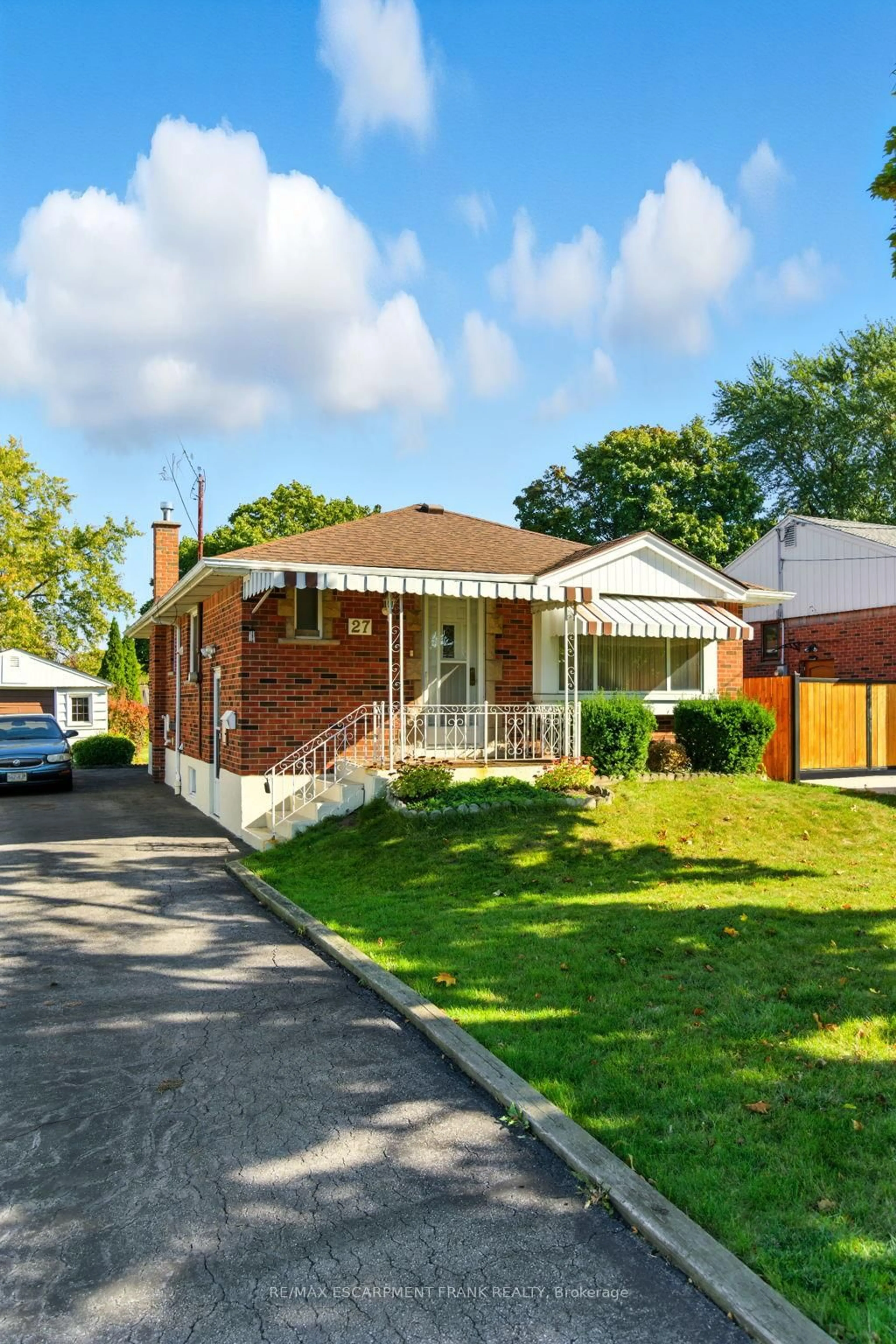 Home with brick exterior material, street for 27 Warren Ave, Hamilton Ontario L9A 3C7
