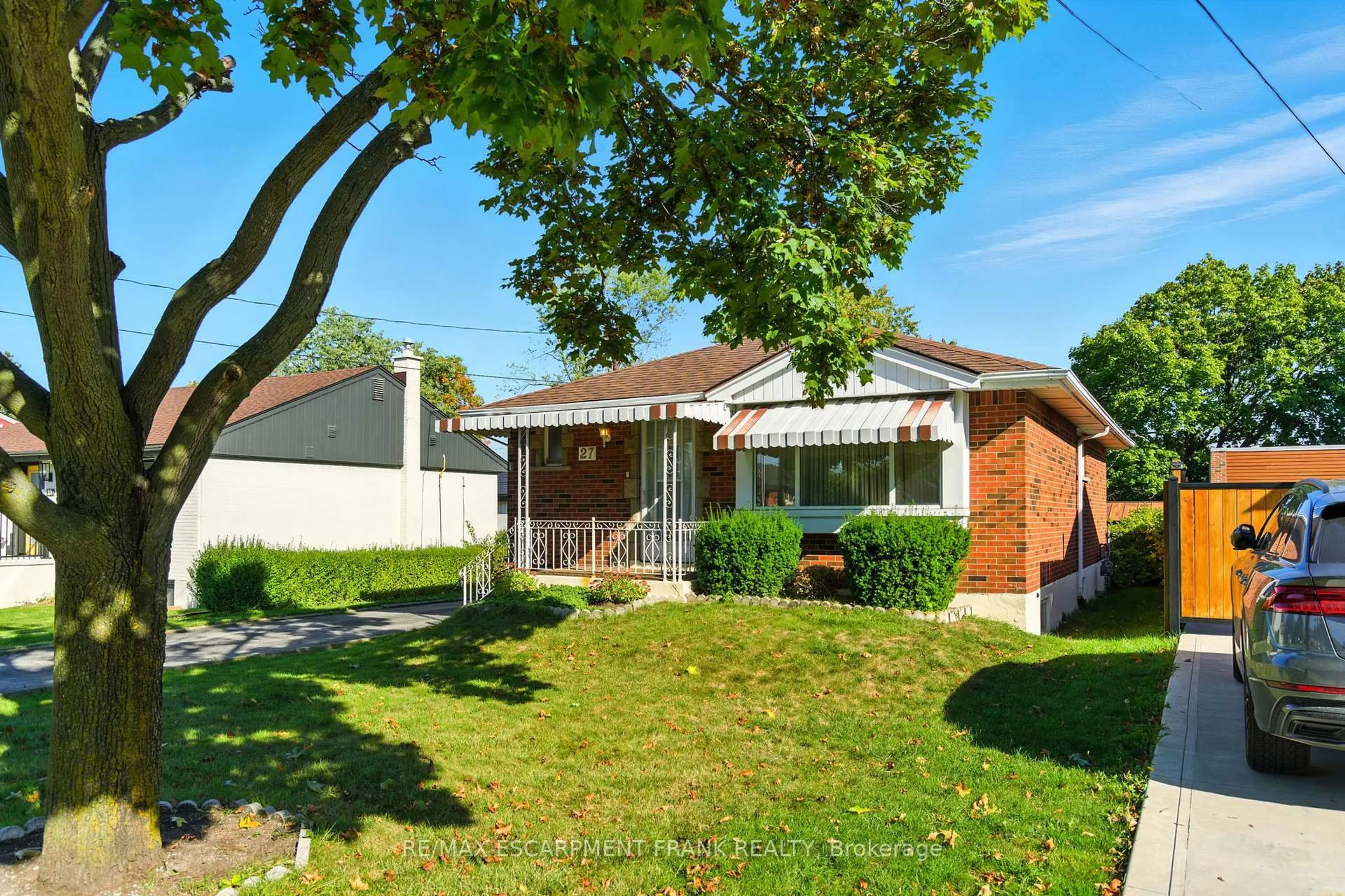 Home with brick exterior material, street for 27 Warren Ave, Hamilton Ontario L9A 3C7
