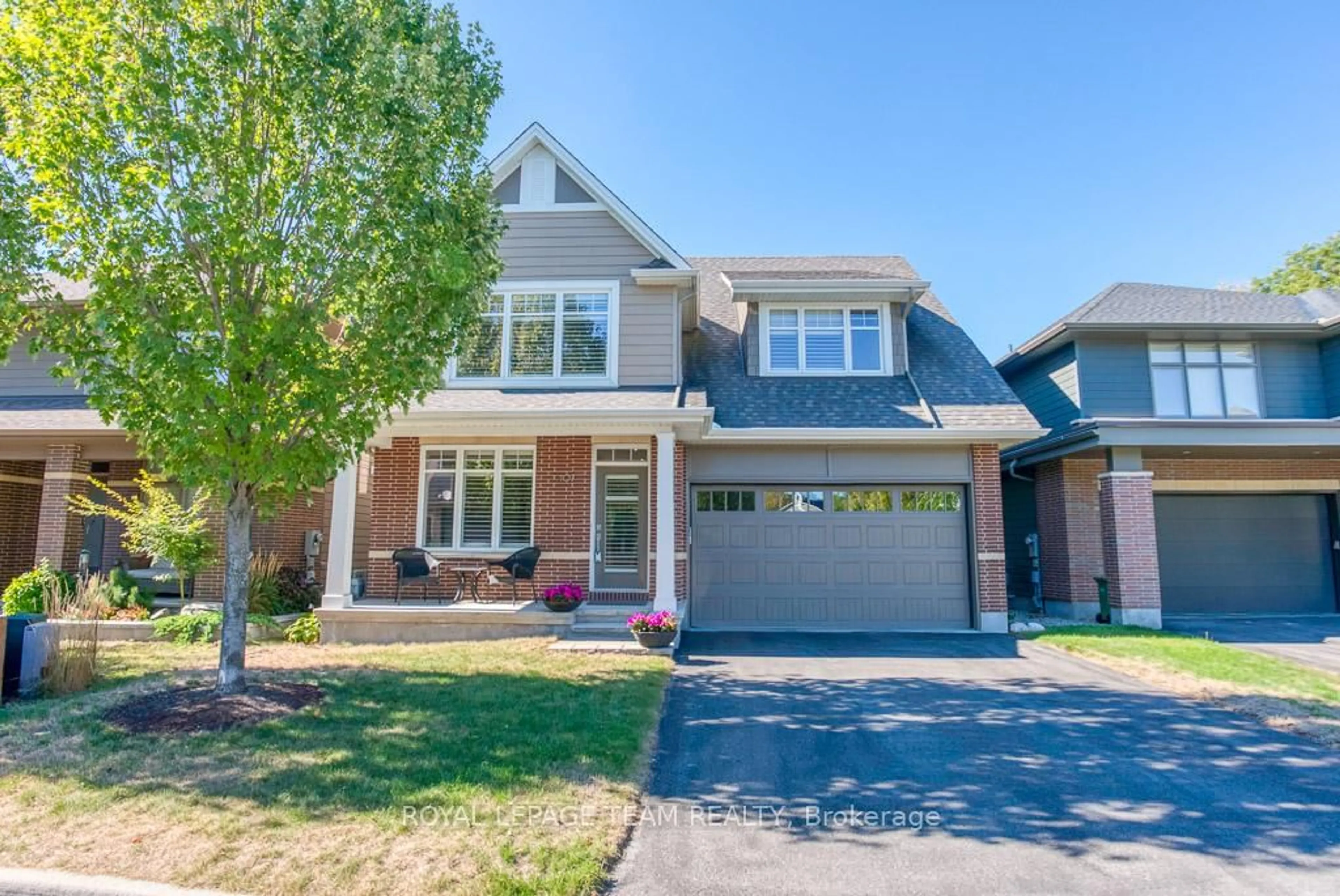 Home with brick exterior material, street for 107 Kitsilano Crt, Ottawa Ontario K2H 0B5