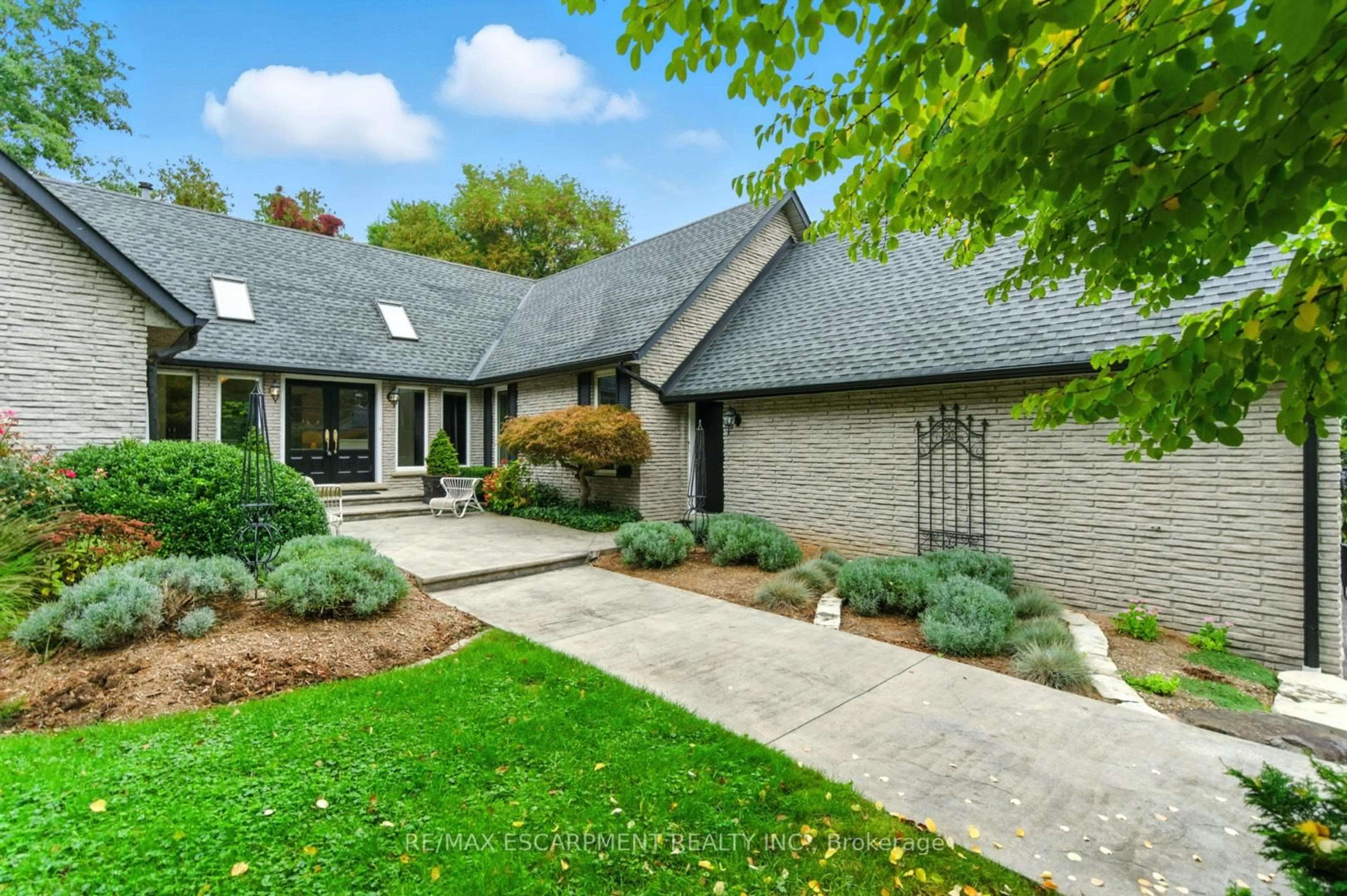 Home with brick exterior material, street for 65 Maple Ave, Hamilton Ontario L9H 4W6