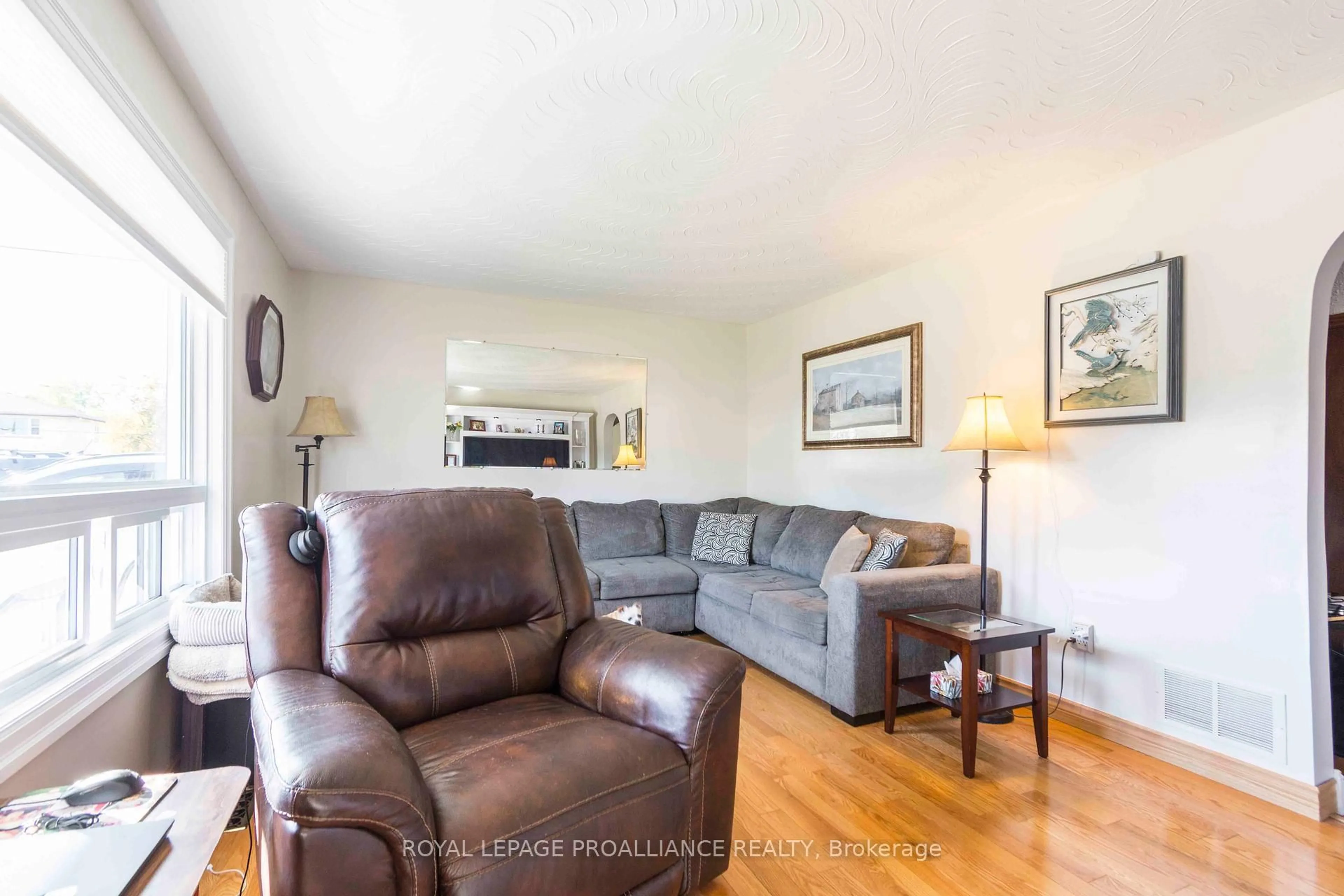 Living room with furniture, wood/laminate floor for 6 Kerr Cres, Quinte West Ontario K8V 2W3