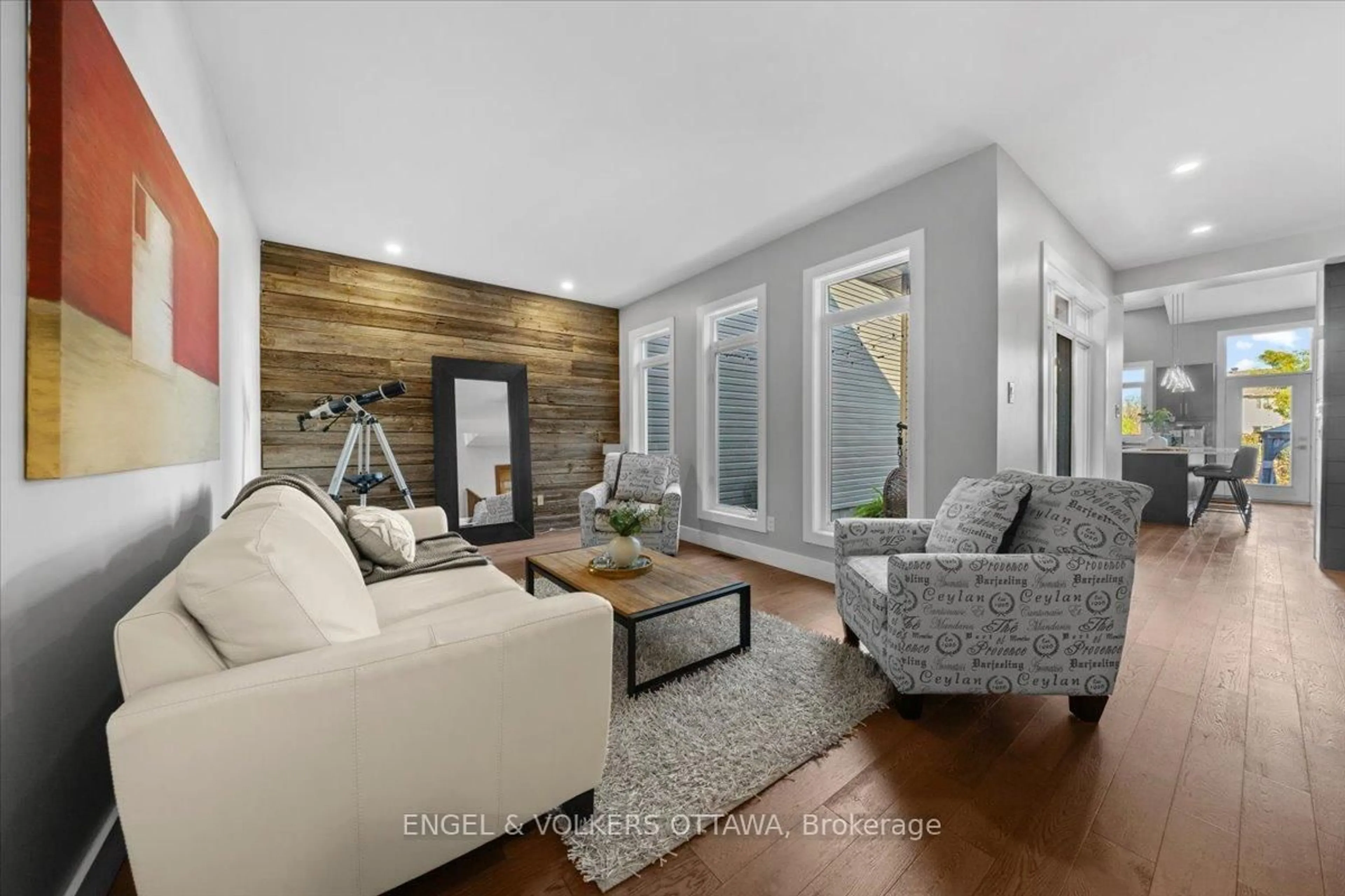Living room with furniture, wood/laminate floor for 1003 Markwick Cres, Ottawa Ontario K4A 4X5