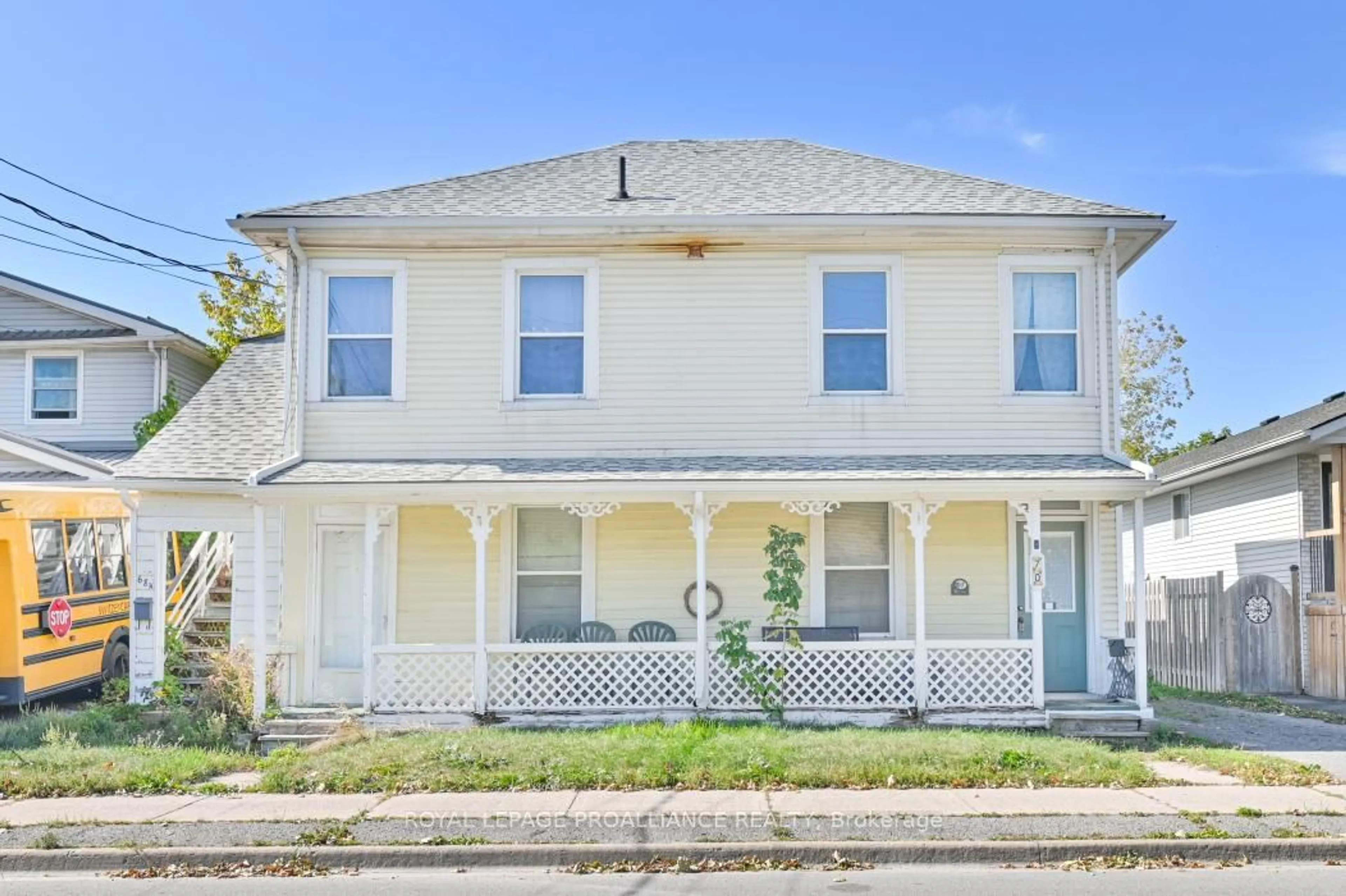 Home with vinyl exterior material, street for 68-70 George St, Belleville Ontario K8N 3G6