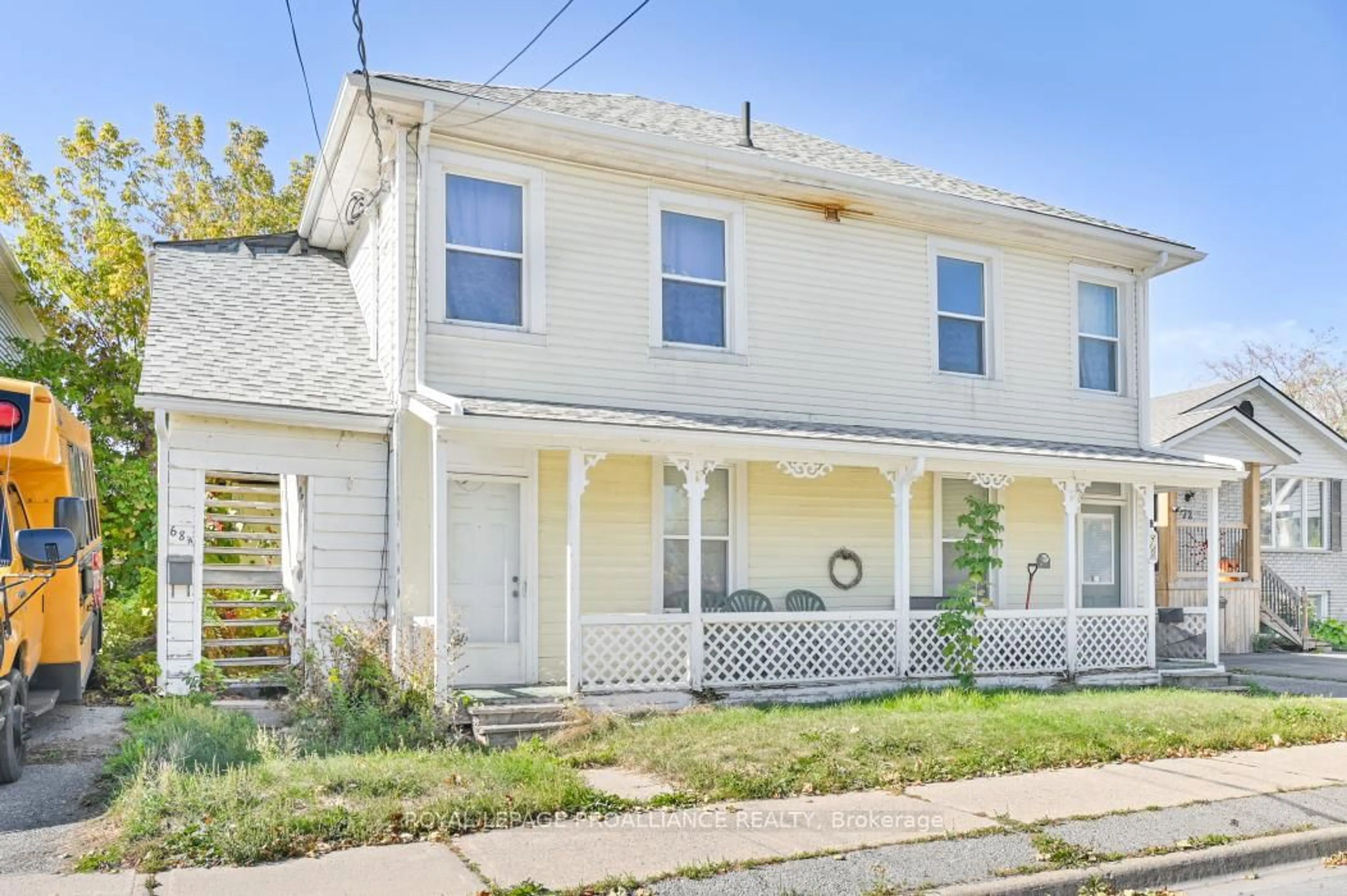 Home with vinyl exterior material, street for 68-70 George St, Belleville Ontario K8N 3G6