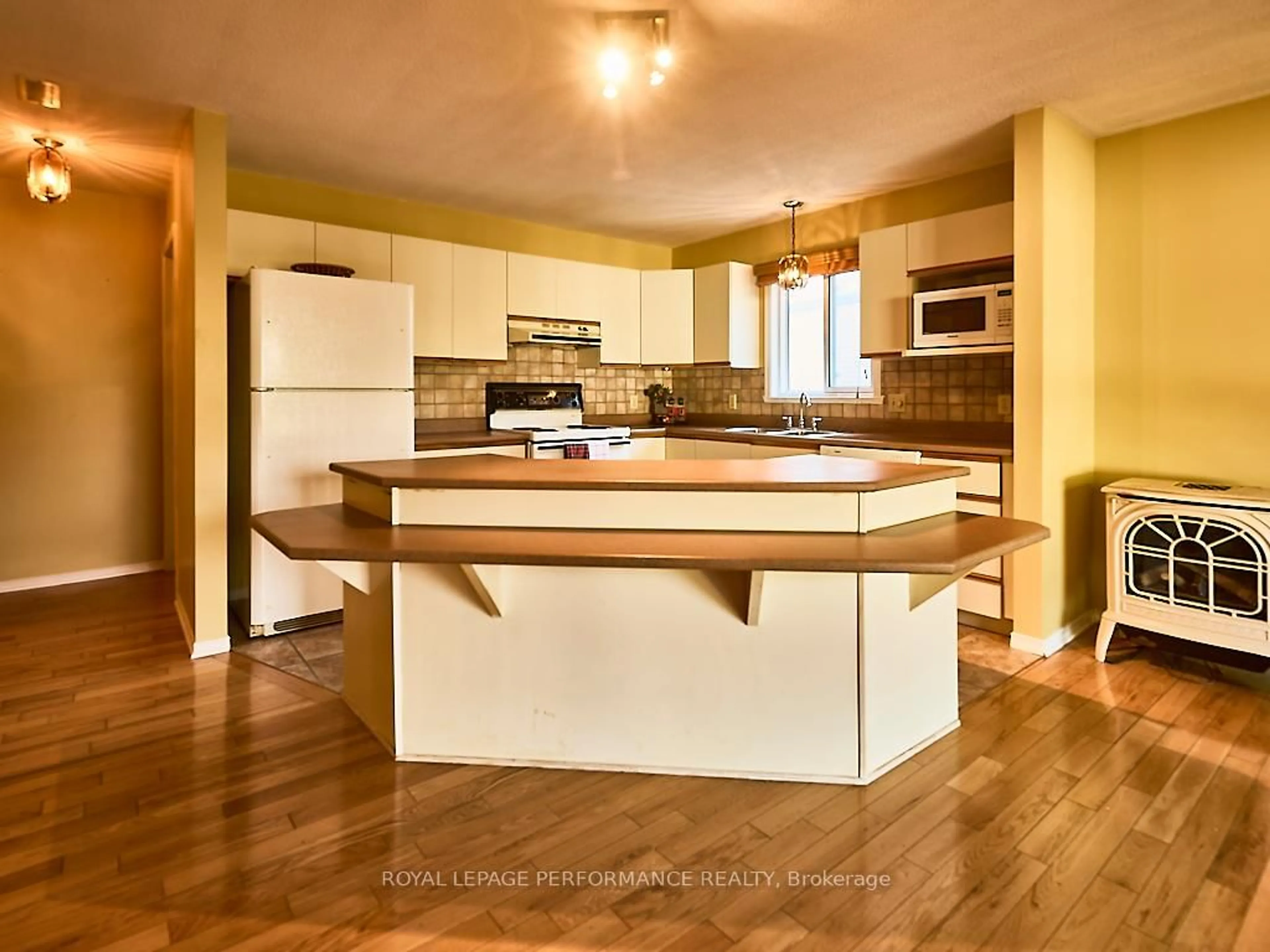 Open concept kitchen, wood/laminate floor for 740 Berthiaume St, Hawkesbury Ontario K6A 3M1
