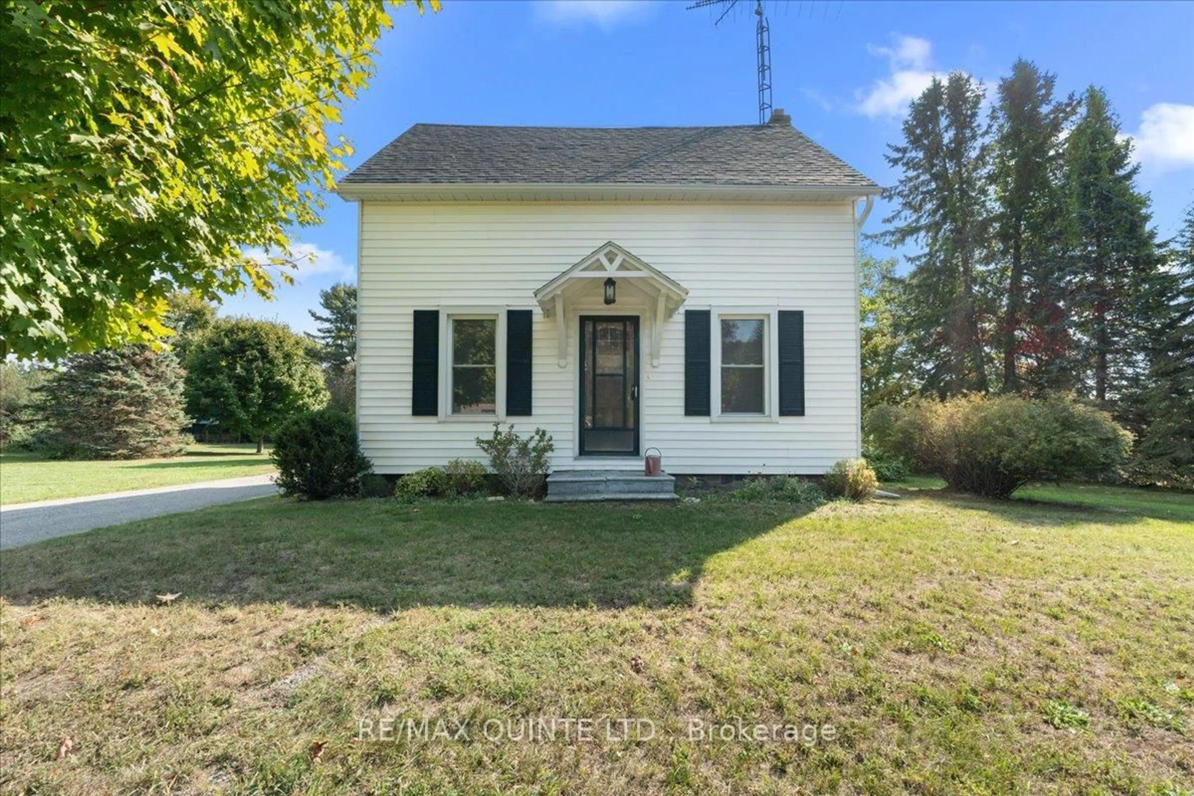 Home with vinyl exterior material, street for 1501 County Road 12 Rd, Prince Edward County Ontario K0K 2T0