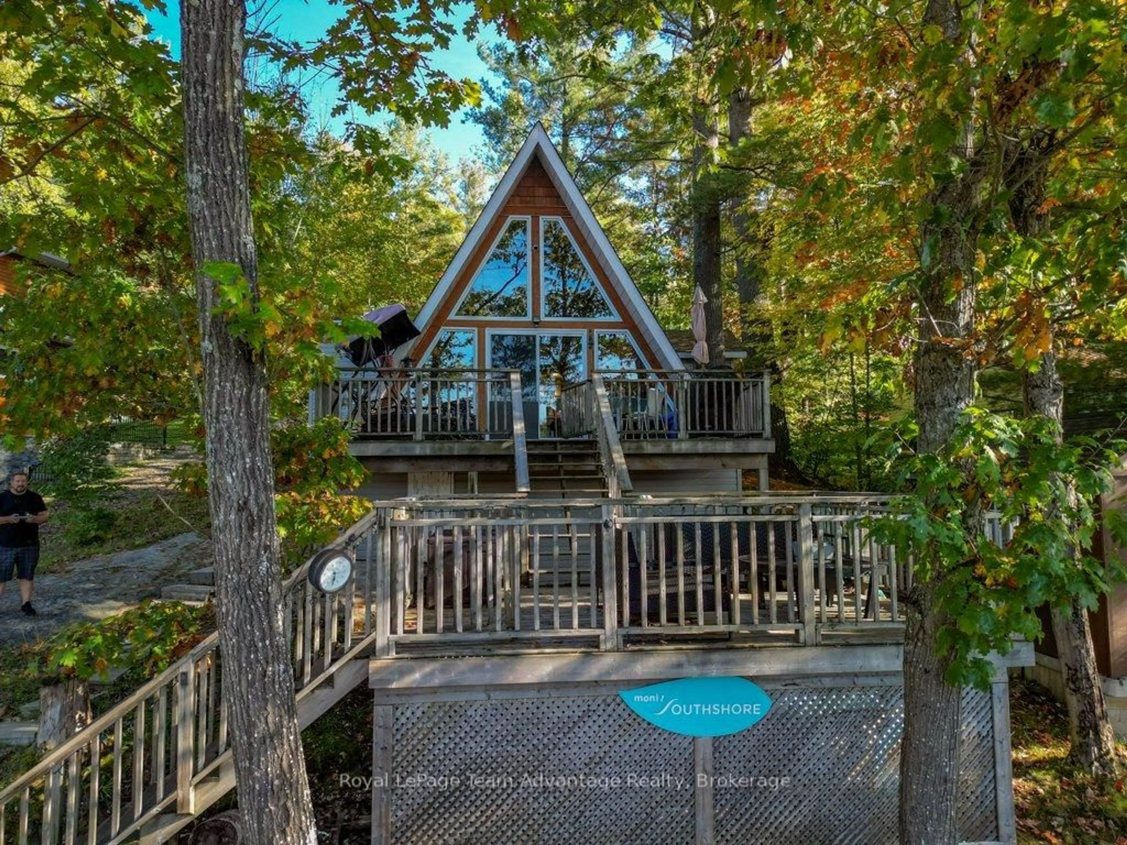 A pic from outside/outdoor area/front of a property/back of a property/a pic from drone, water/lake/river/ocean view for 52 Windfall Lake Rd, Seguin Ontario P2A 0B2