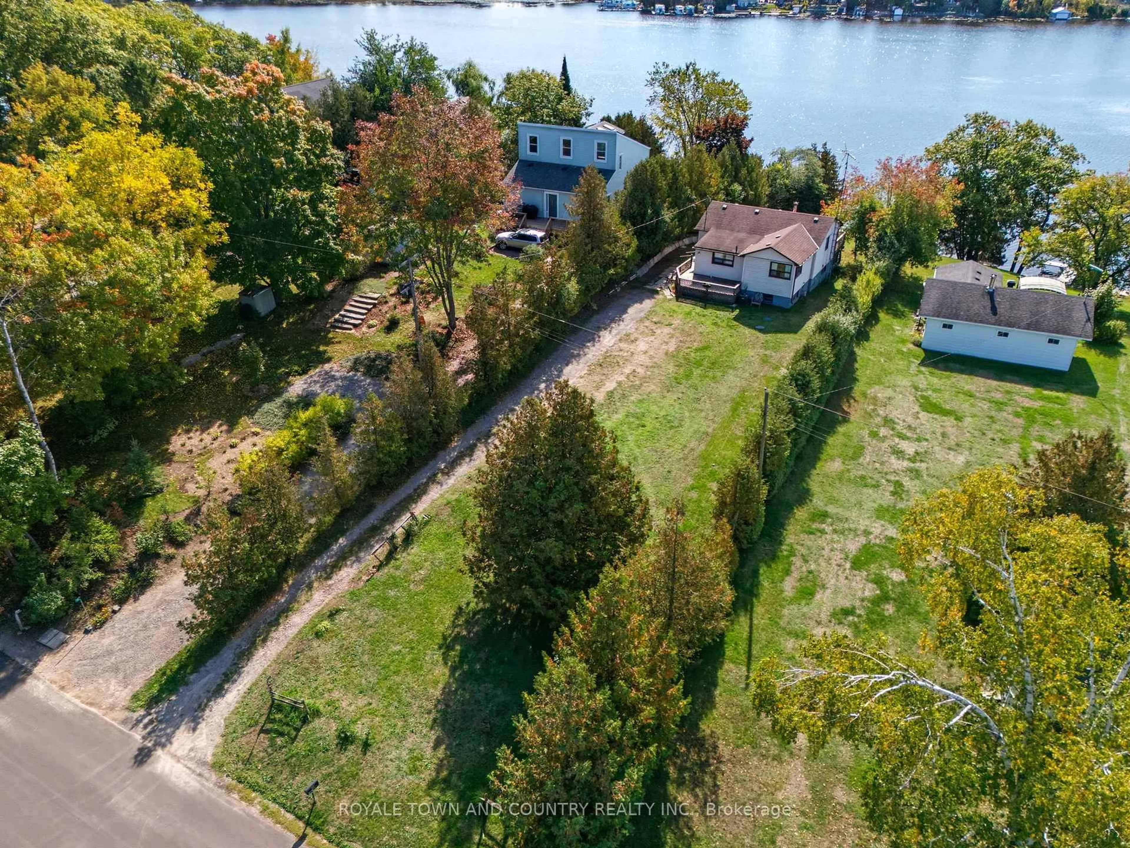 A pic from outside/outdoor area/front of a property/back of a property/a pic from drone, water/lake/river/ocean view for 68 Charlore Park Dr, Kawartha Lakes Ontario K0L 2W0