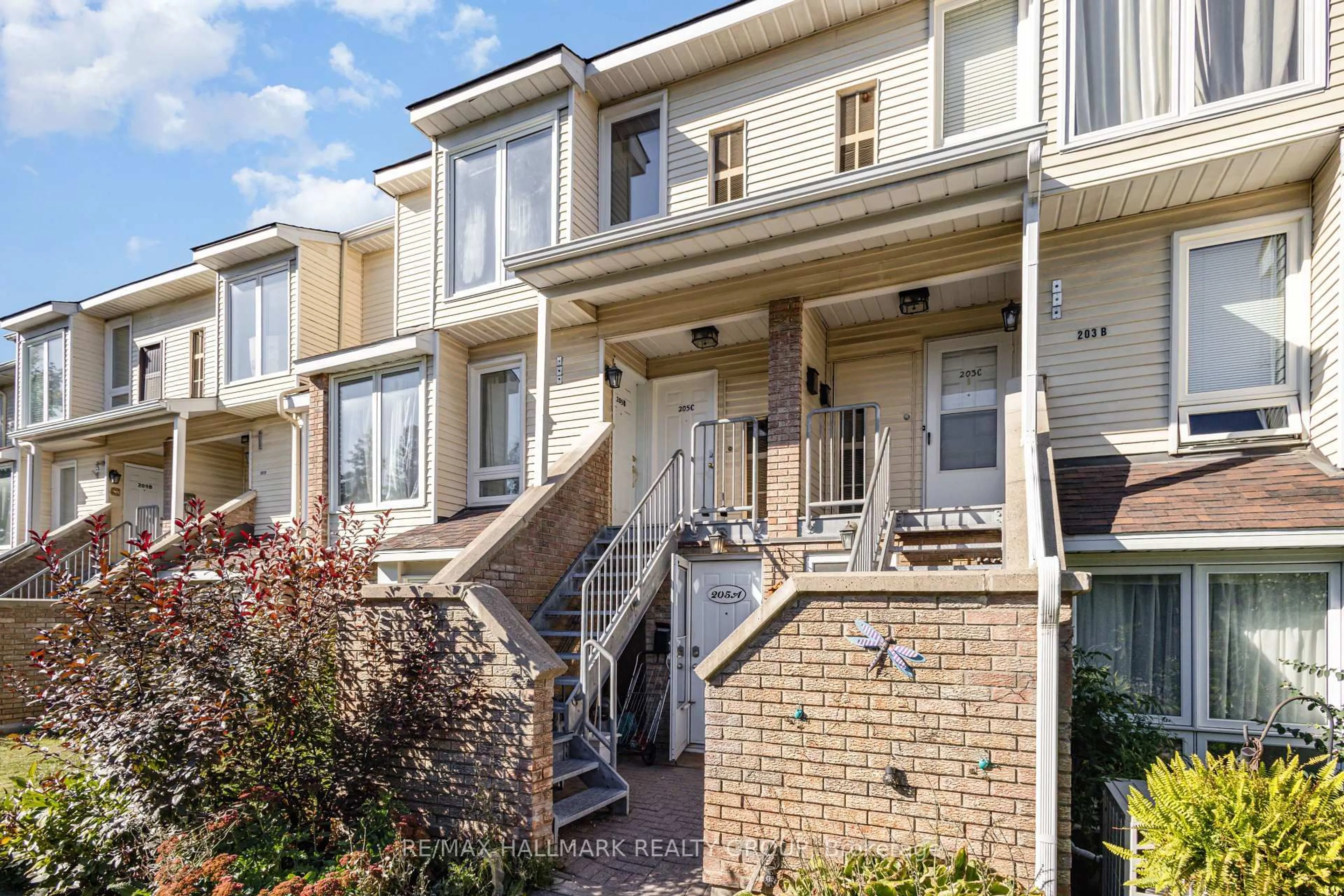 Home with brick exterior material, street for 205 Woodfield Dr #C, Ottawa Ontario K2G 4P2