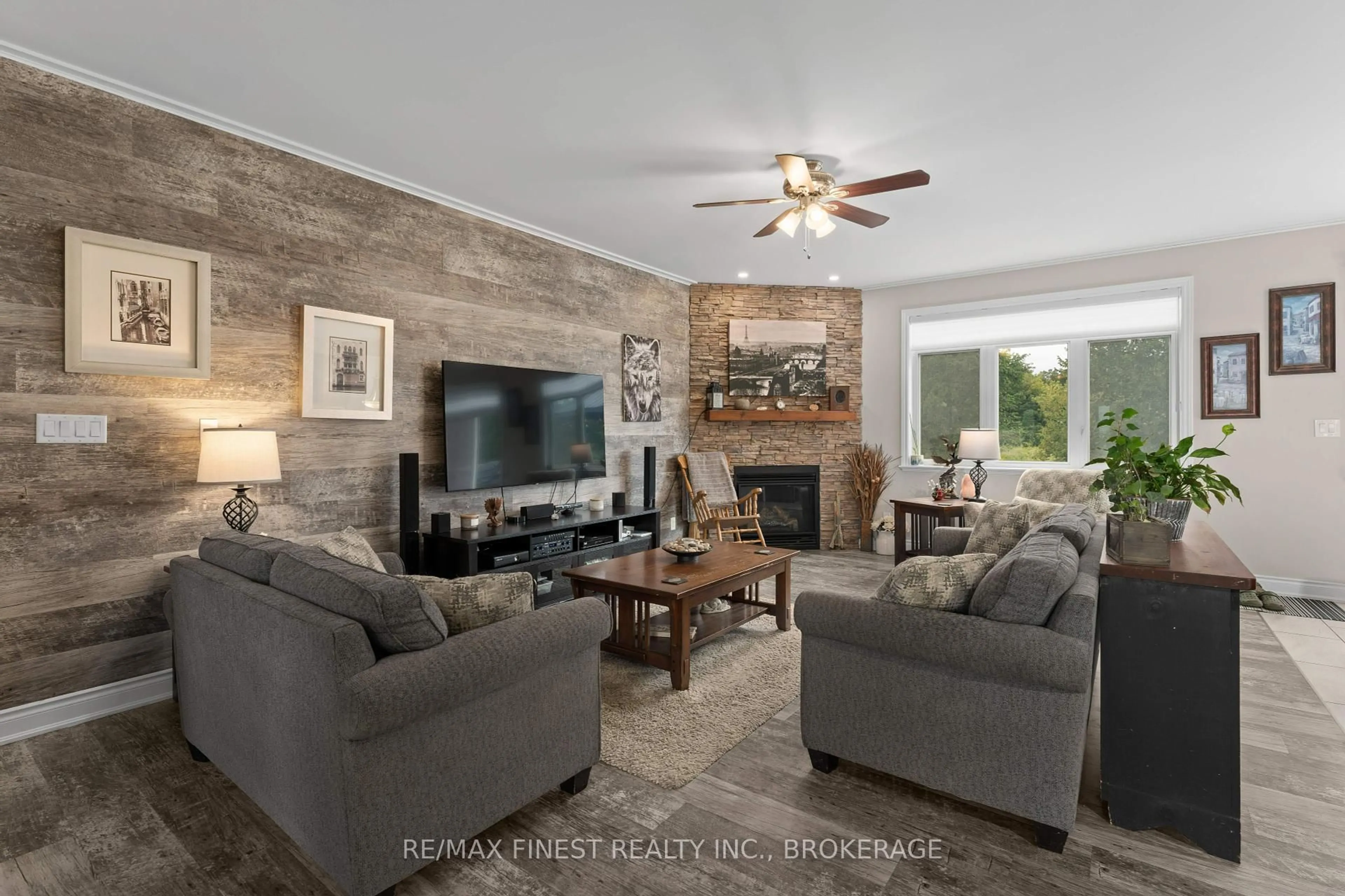 Living room with furniture, unknown for 3527 Battersea Rd, Bissett Creek Ontario K0H 2H0