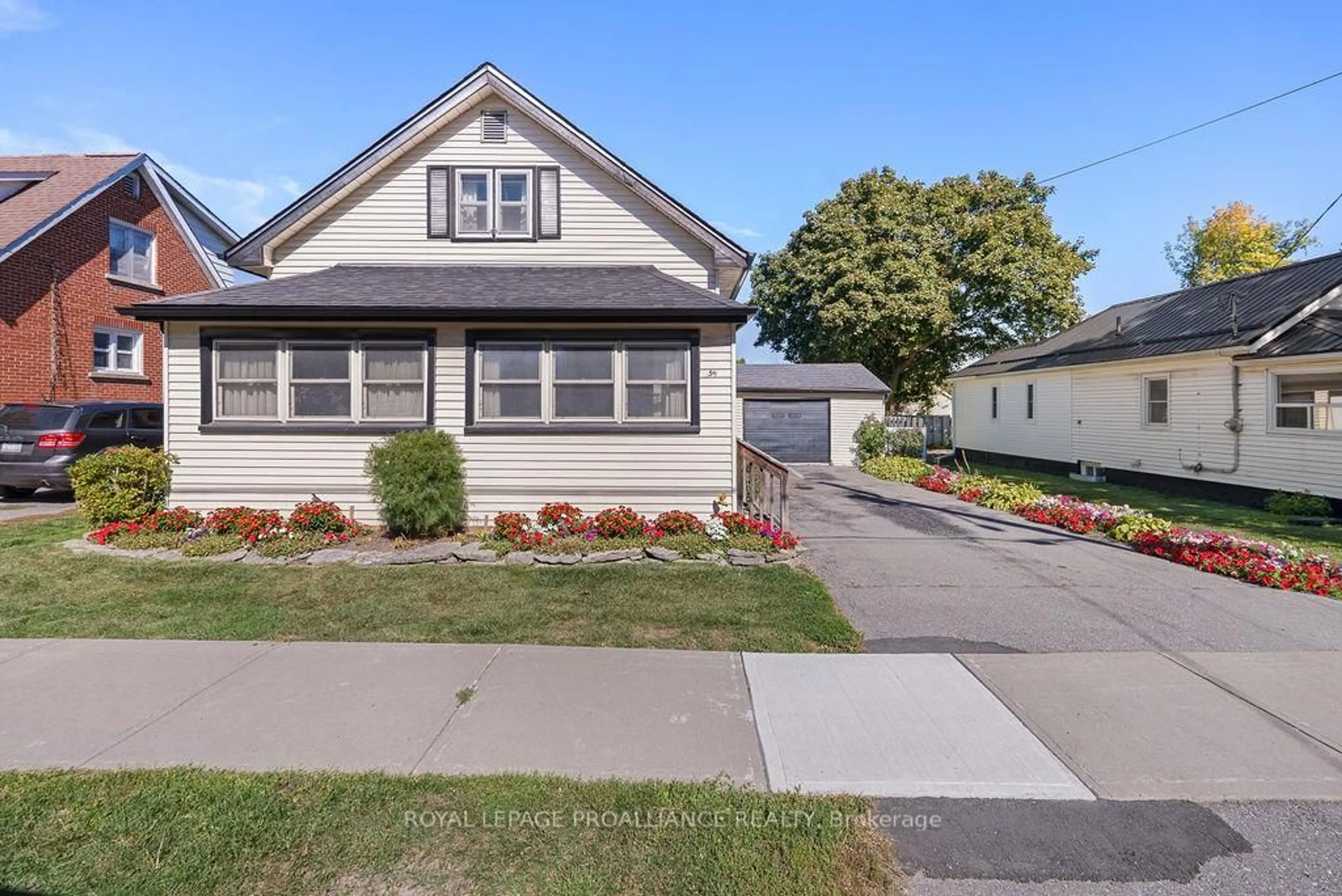 Home with vinyl exterior material, street for 59 Purdy St, Belleville Ontario K8P 1Y8