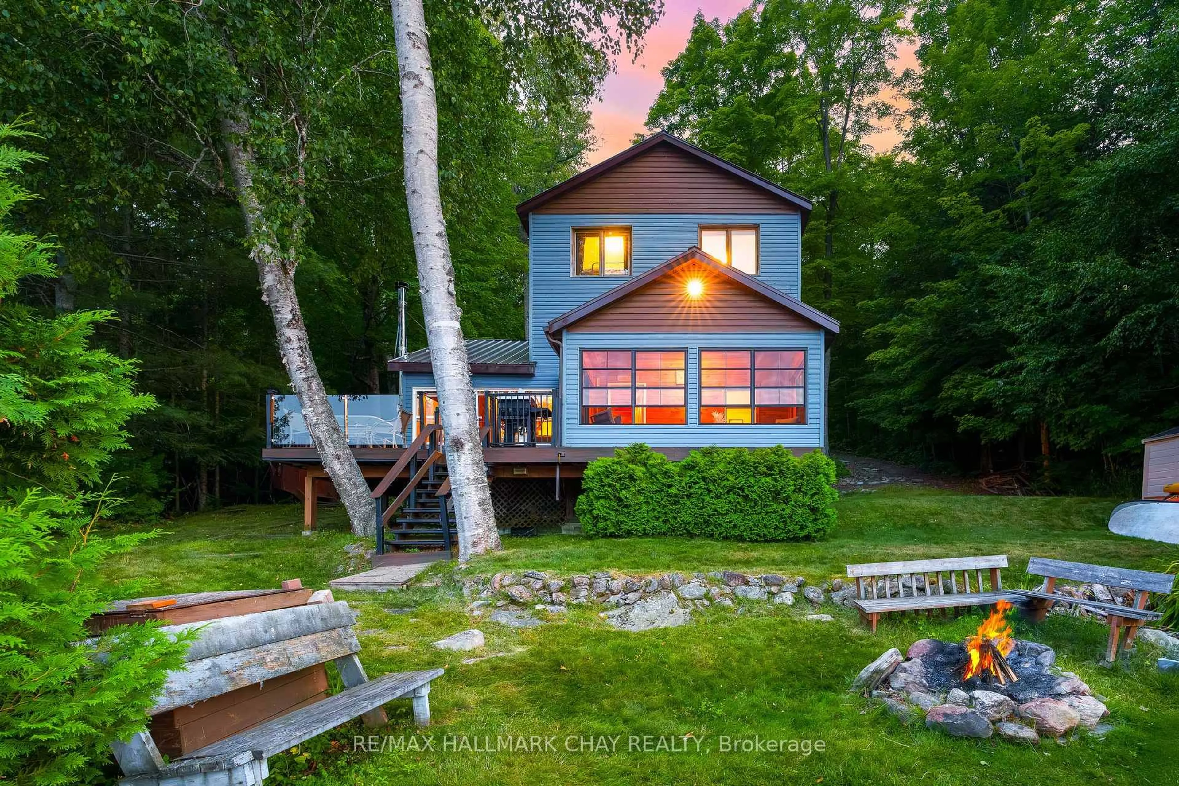 A pic from outside/outdoor area/front of a property/back of a property/a pic from drone, water/lake/river/ocean view for 1104 Hammond Rd, Lake of Bays Ontario P0B 1A0