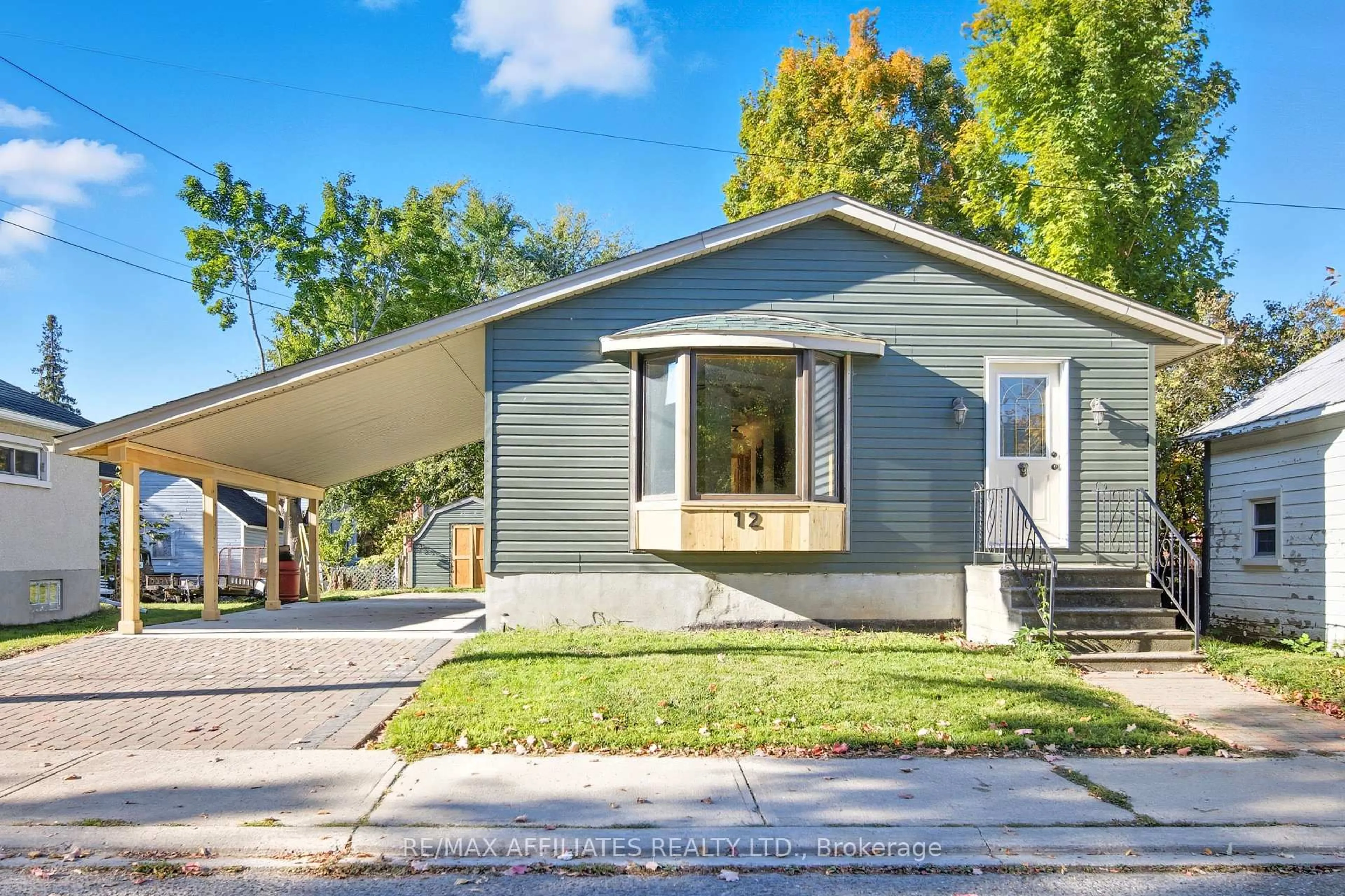 Home with vinyl exterior material, street for 12 Prince St, Carleton Place Ontario K7C 2M4