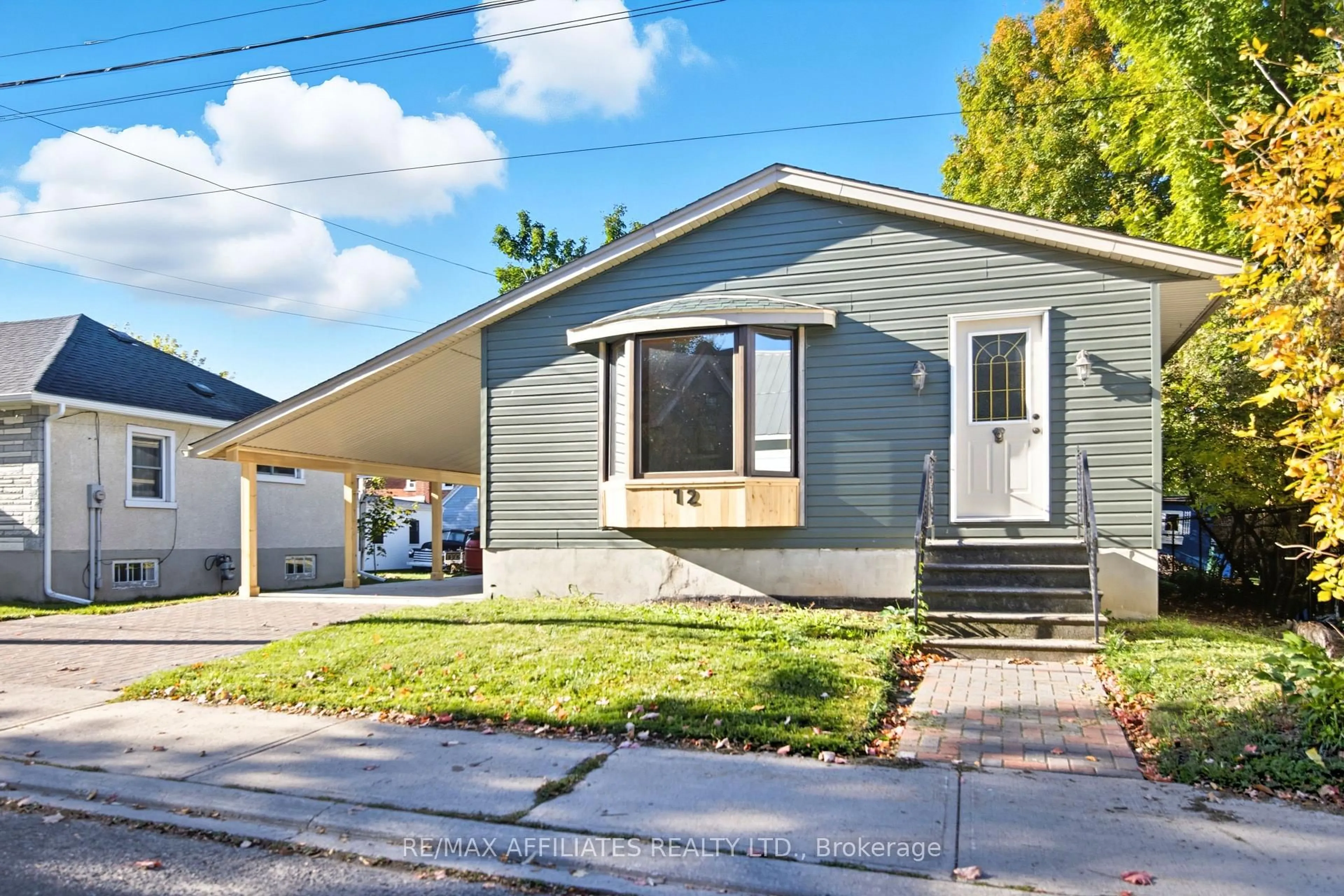 Home with vinyl exterior material, street for 12 Prince St, Carleton Place Ontario K7C 2M4