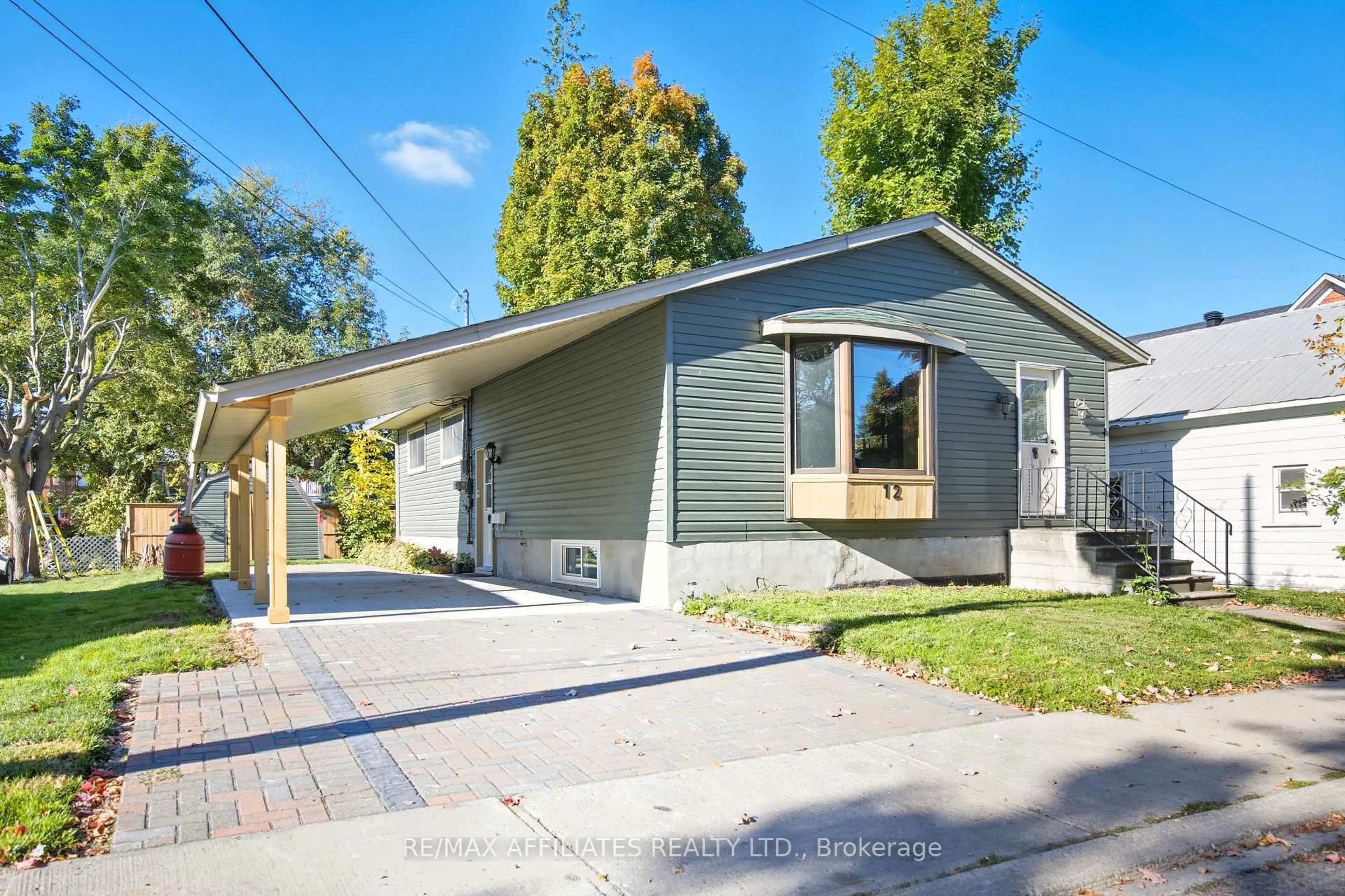 Home with vinyl exterior material, street for 12 Prince St, Carleton Place Ontario K7C 2M4