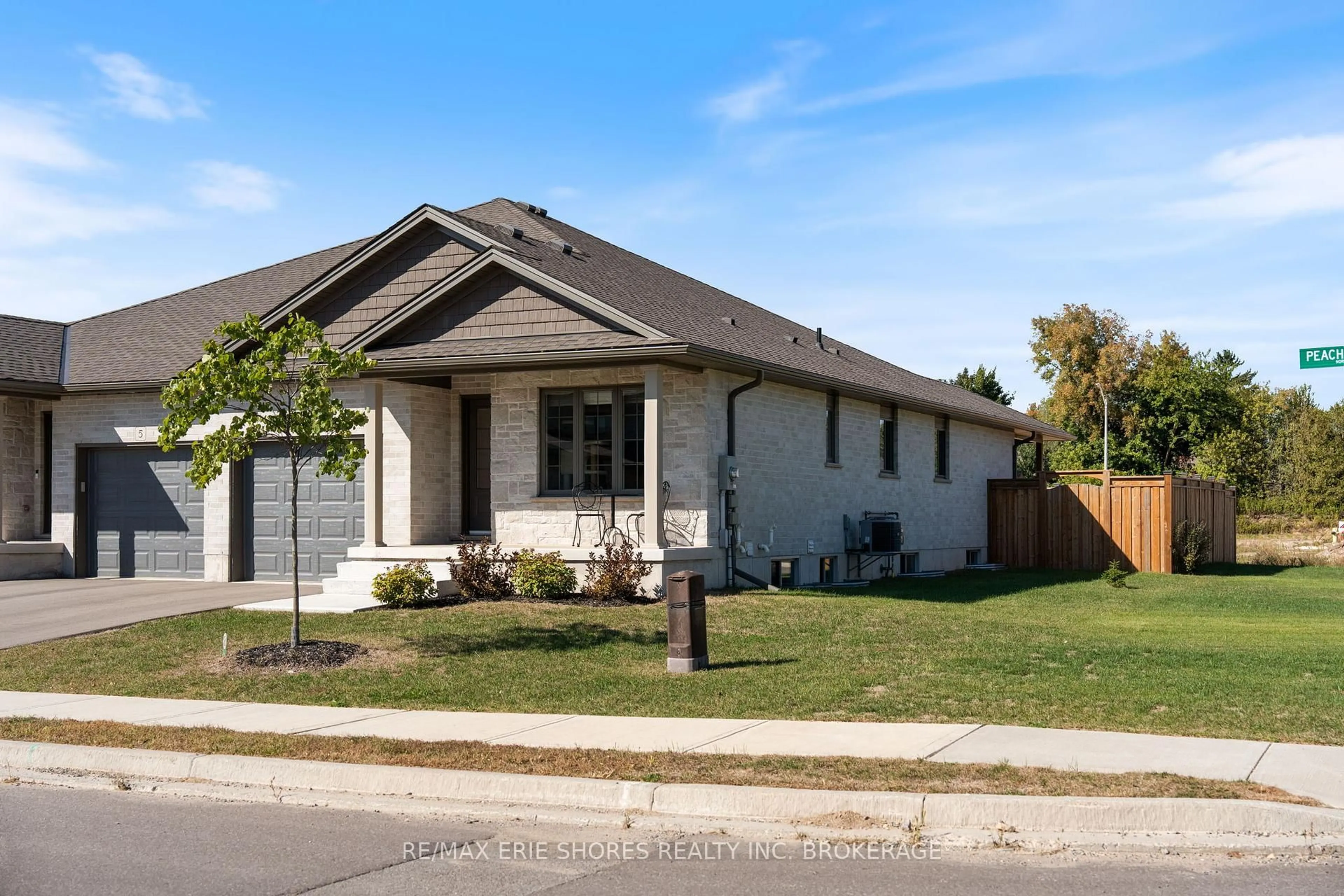 Home with brick exterior material, street for 1 Peachleaf Lane, Norfolk Ontario N0E 1Y0