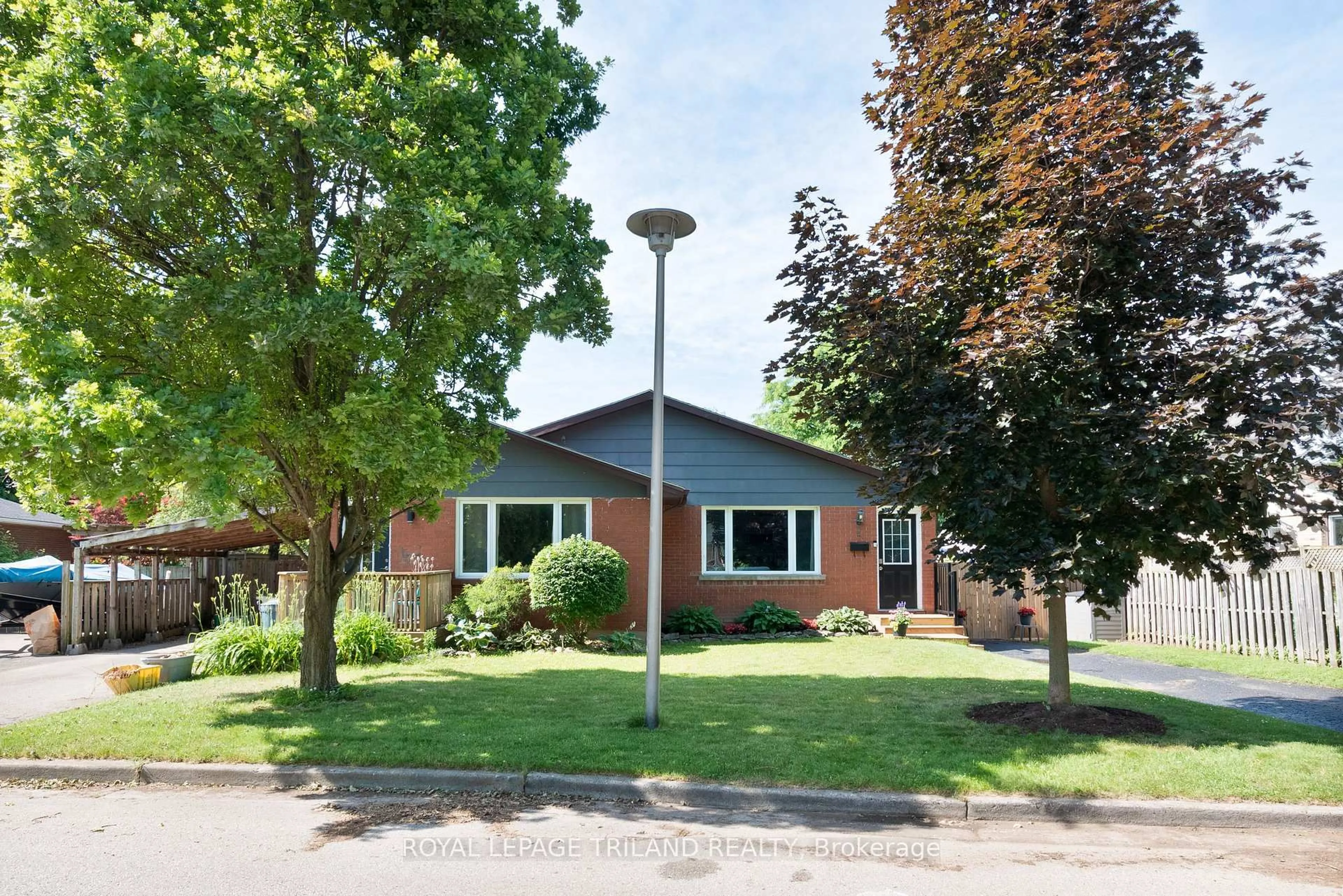 A pic from outside/outdoor area/front of a property/back of a property/a pic from drone, street for 15 Mohegan Cres, London East Ontario N5V 2X7