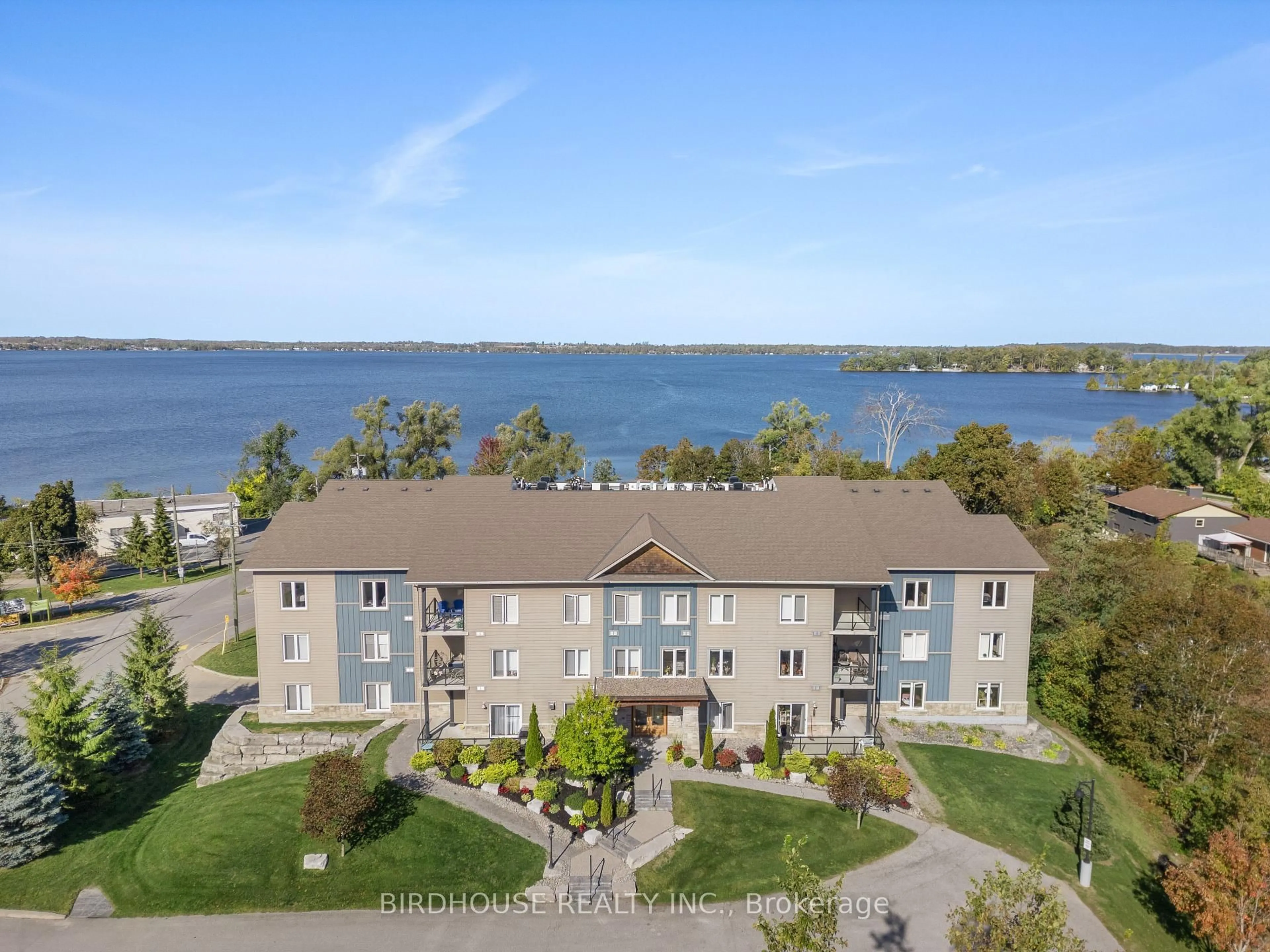 A pic from outside/outdoor area/front of a property/back of a property/a pic from drone, water/lake/river/ocean view for 94 Francis St #301, Kawartha Lakes Ontario K0M 1N0