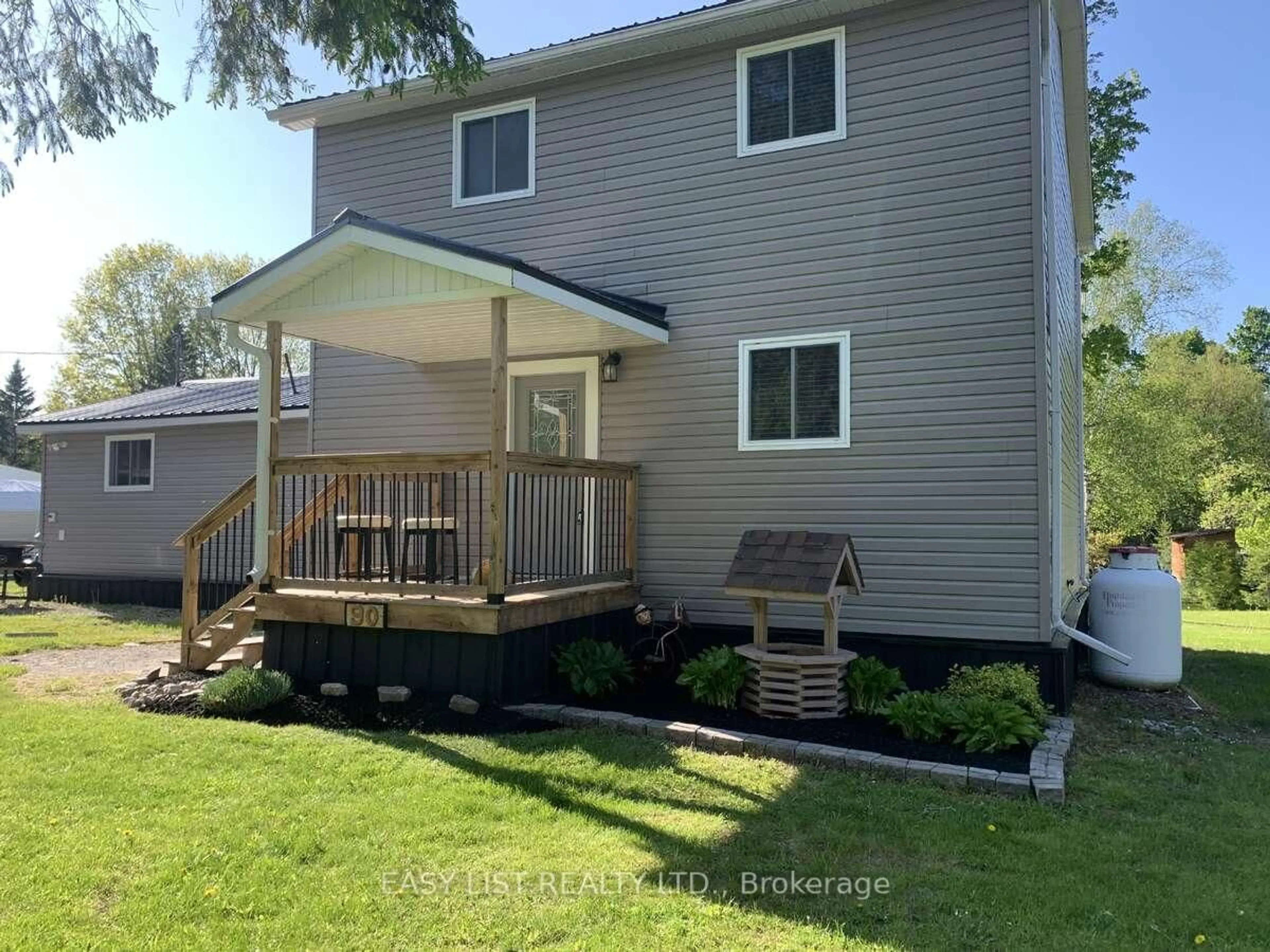 Home with vinyl exterior material, street for 90 Kozy Kove Rd, Kawartha Lakes Ontario K0M 1C0