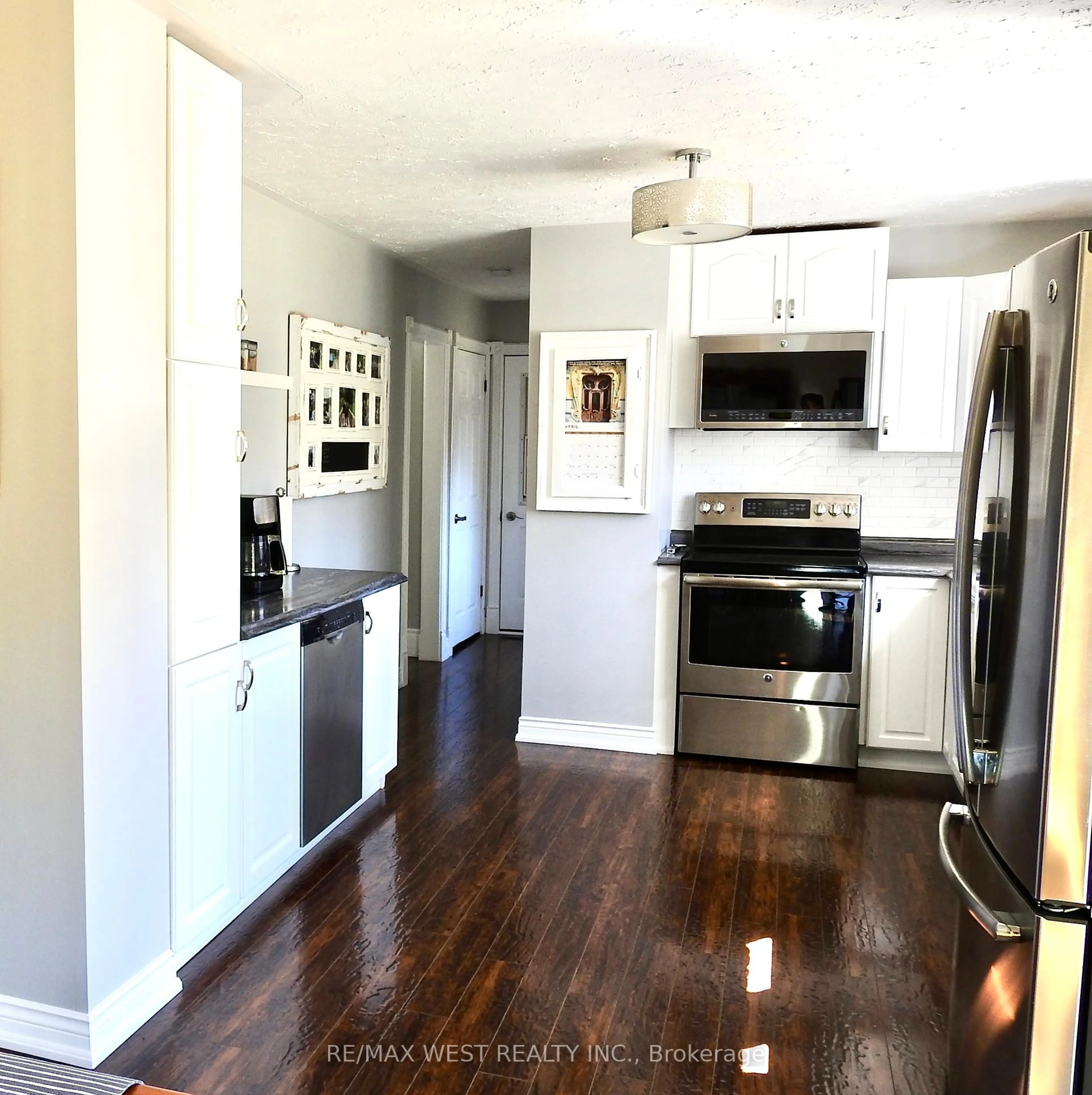 Open concept kitchen, wood/laminate floor for 2593 Alsace Rd, Nipissing Ontario P0H 1Z0