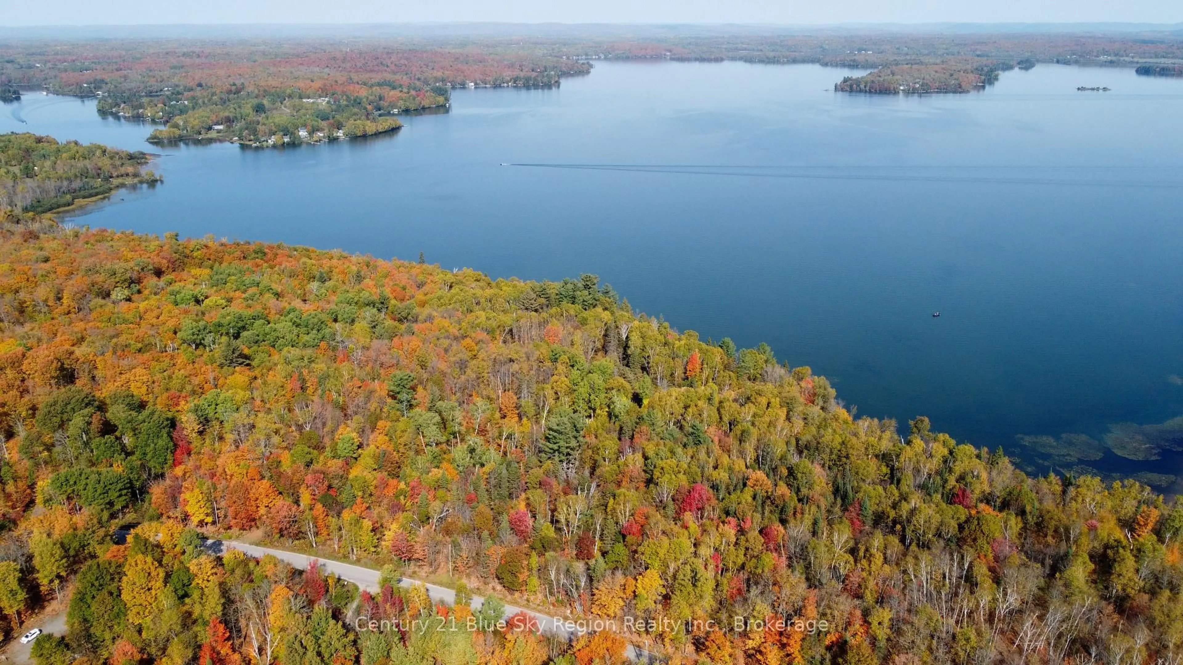 A pic from outside/outdoor area/front of a property/back of a property/a pic from drone, water/lake/river/ocean view for 1061 SOUTH SHORE Rd, East Ferris Ontario P0H 1B0