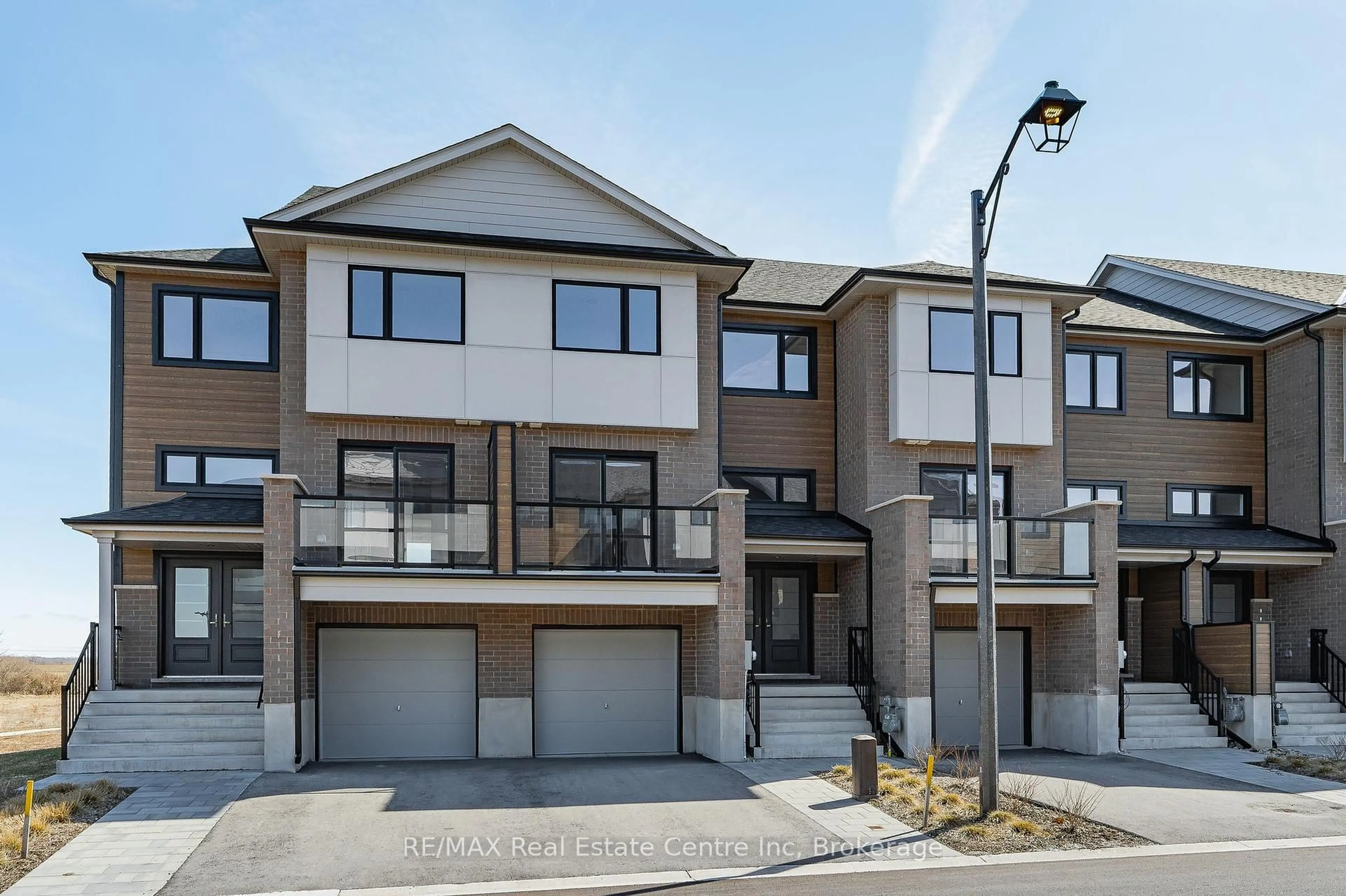 A pic from outside/outdoor area/front of a property/back of a property/a pic from drone, street for 182 Bridge Cres #7, Minto Ontario N0G 2P0