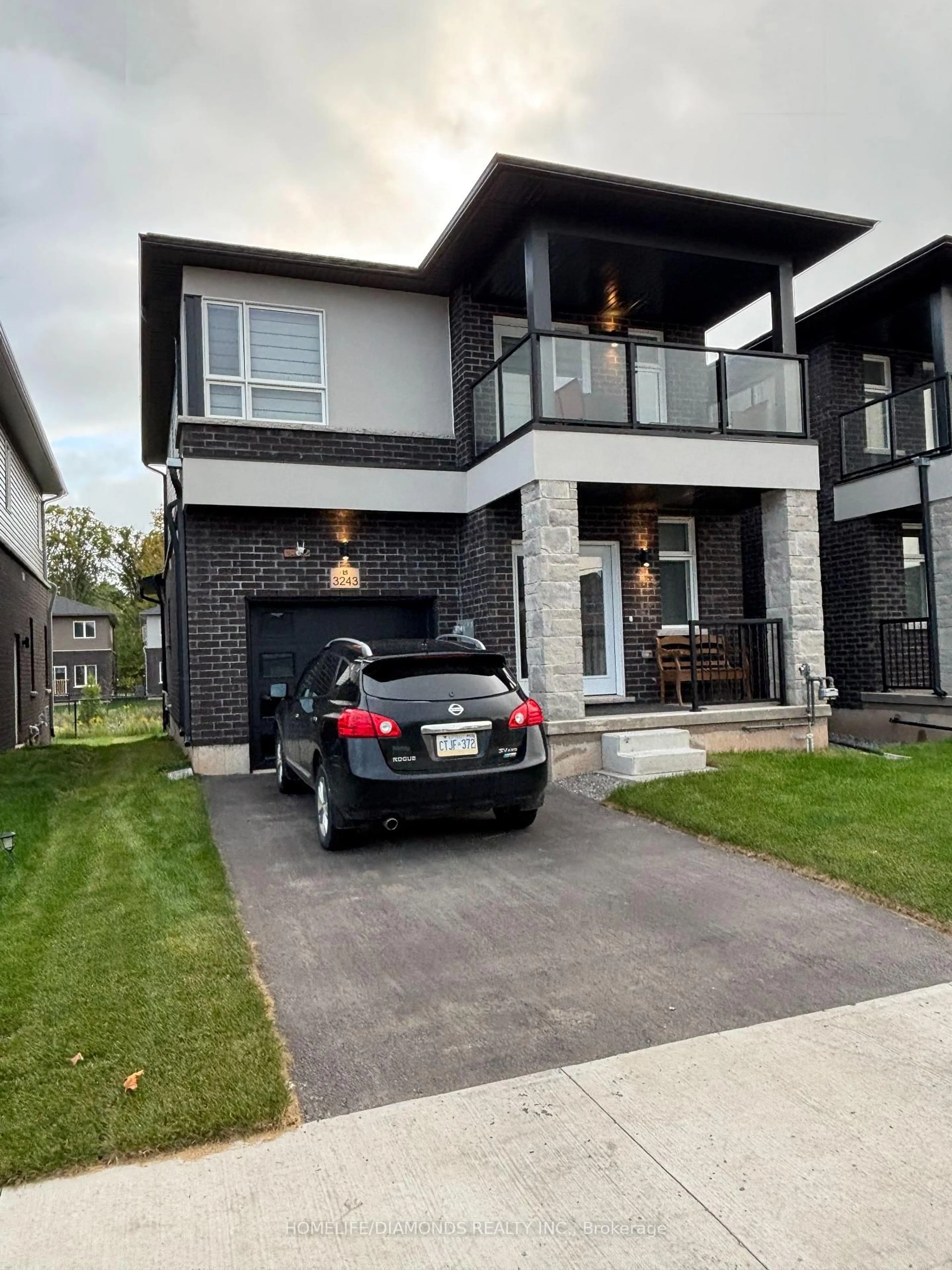 Home with brick exterior material, street for 3243 DOMINION Rd, Fort Erie Ontario L0S 1N0