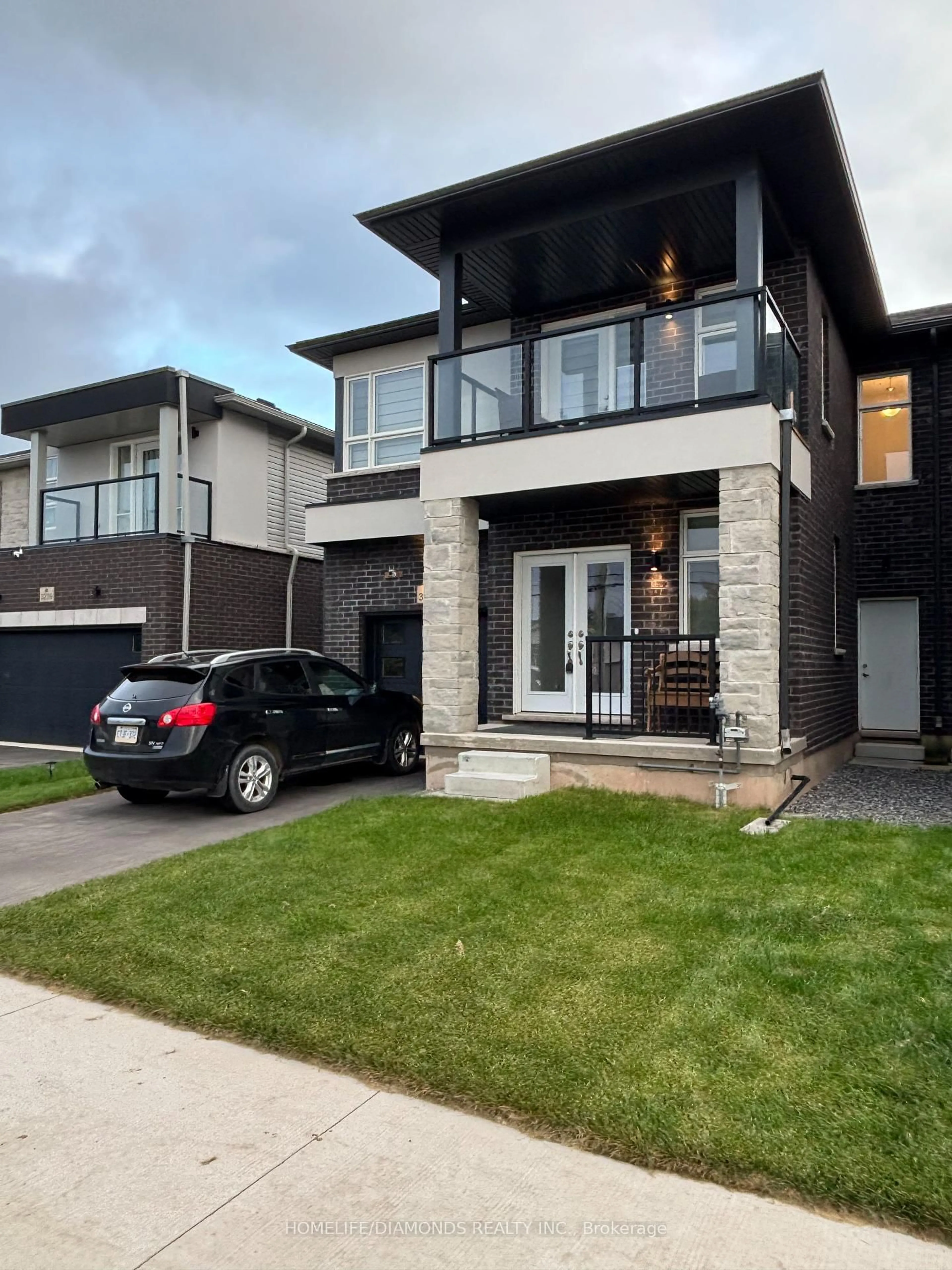 Home with brick exterior material, street for 3243 DOMINION Rd, Fort Erie Ontario L0S 1N0