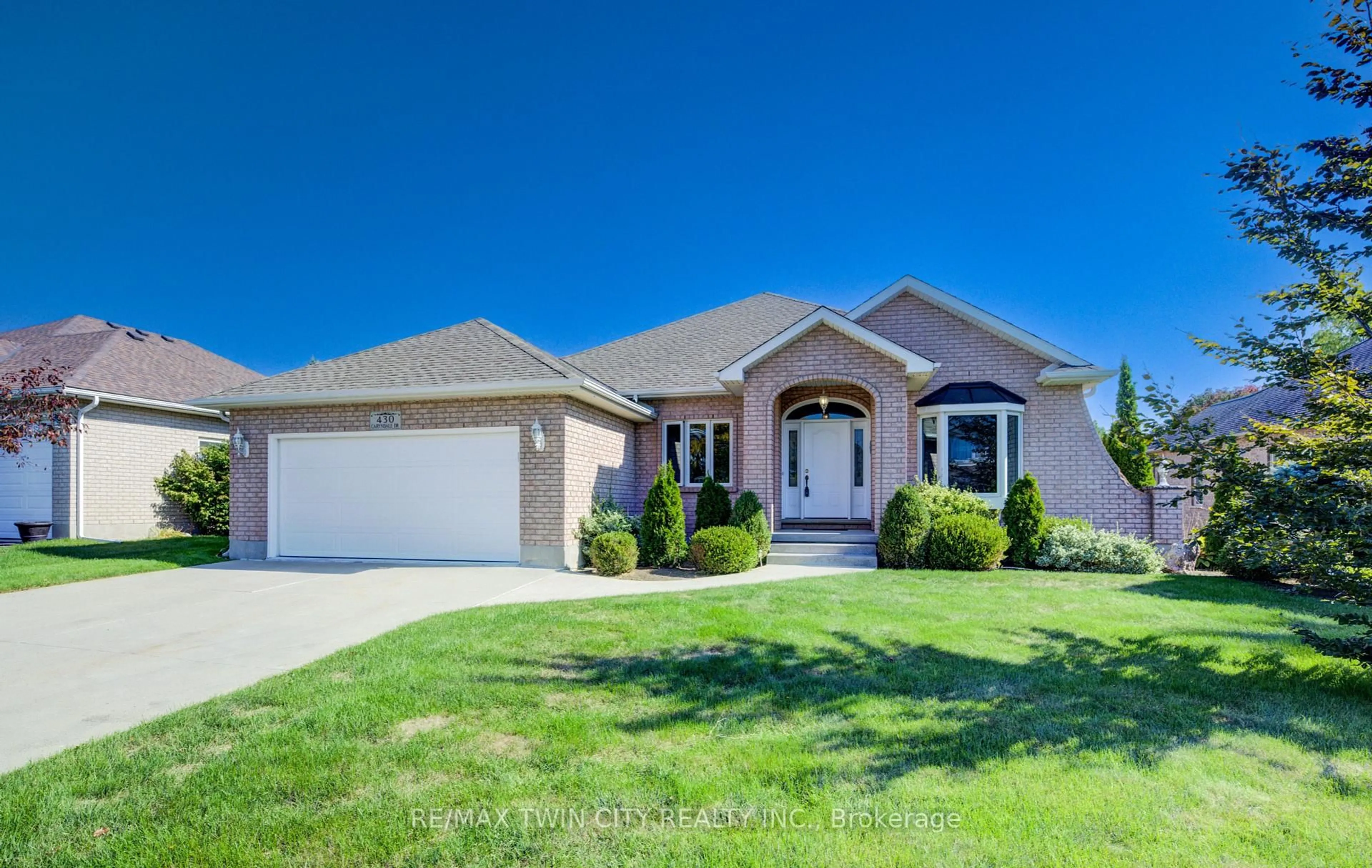 Home with brick exterior material, street for 430 Caryndale Dr, Kitchener Ontario N2R 1M8