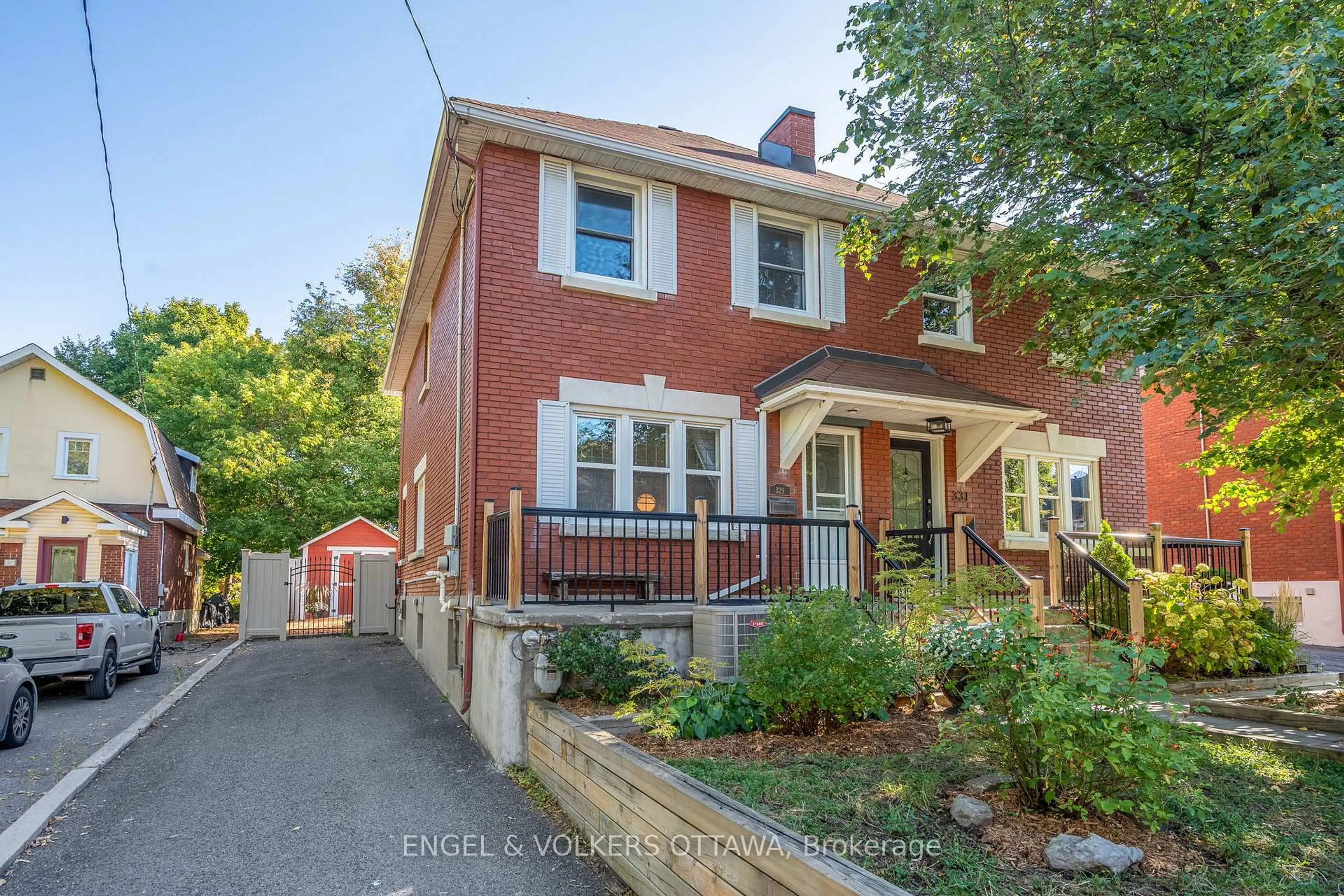 Home with brick exterior material, street for 329 Hamilton Ave, Ottawa Ontario K1Y 1C4