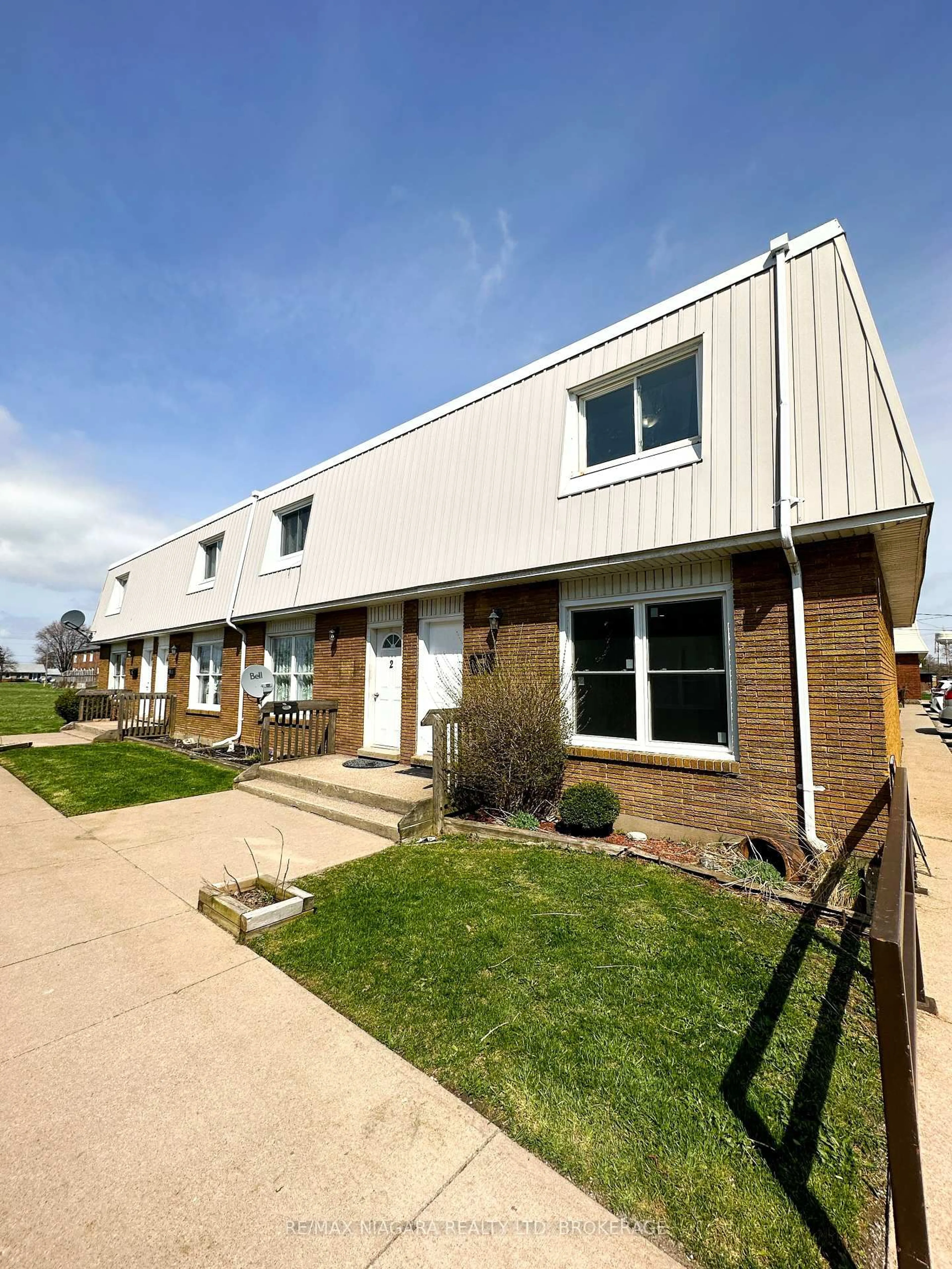 Home with brick exterior material, street for 71 Hagey Ave #1, Fort Erie Ontario L2A 1W5