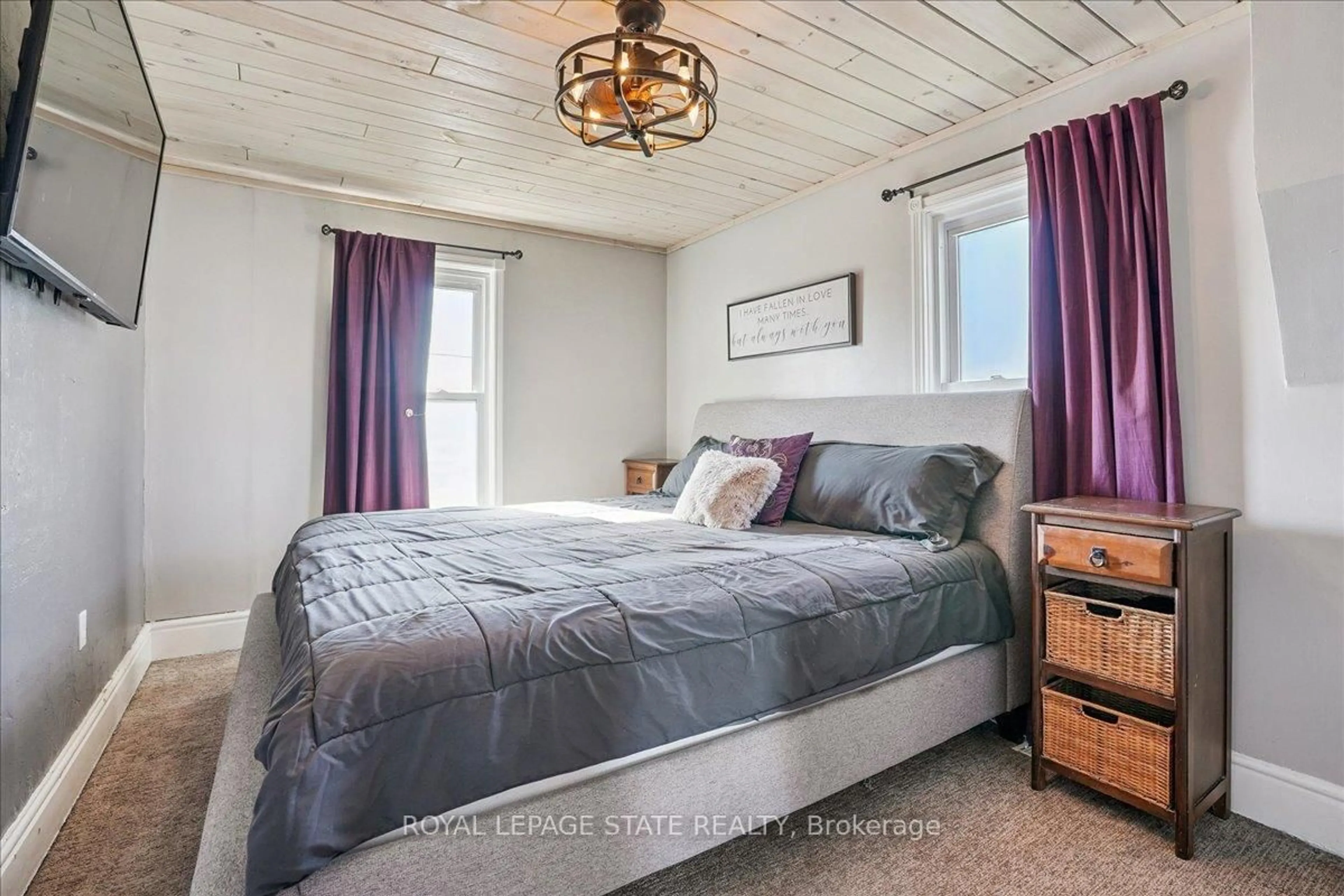 Bedroom with bed, wood/laminate floor for 15 Main Ave, Haldimand Ontario N0A 1G0