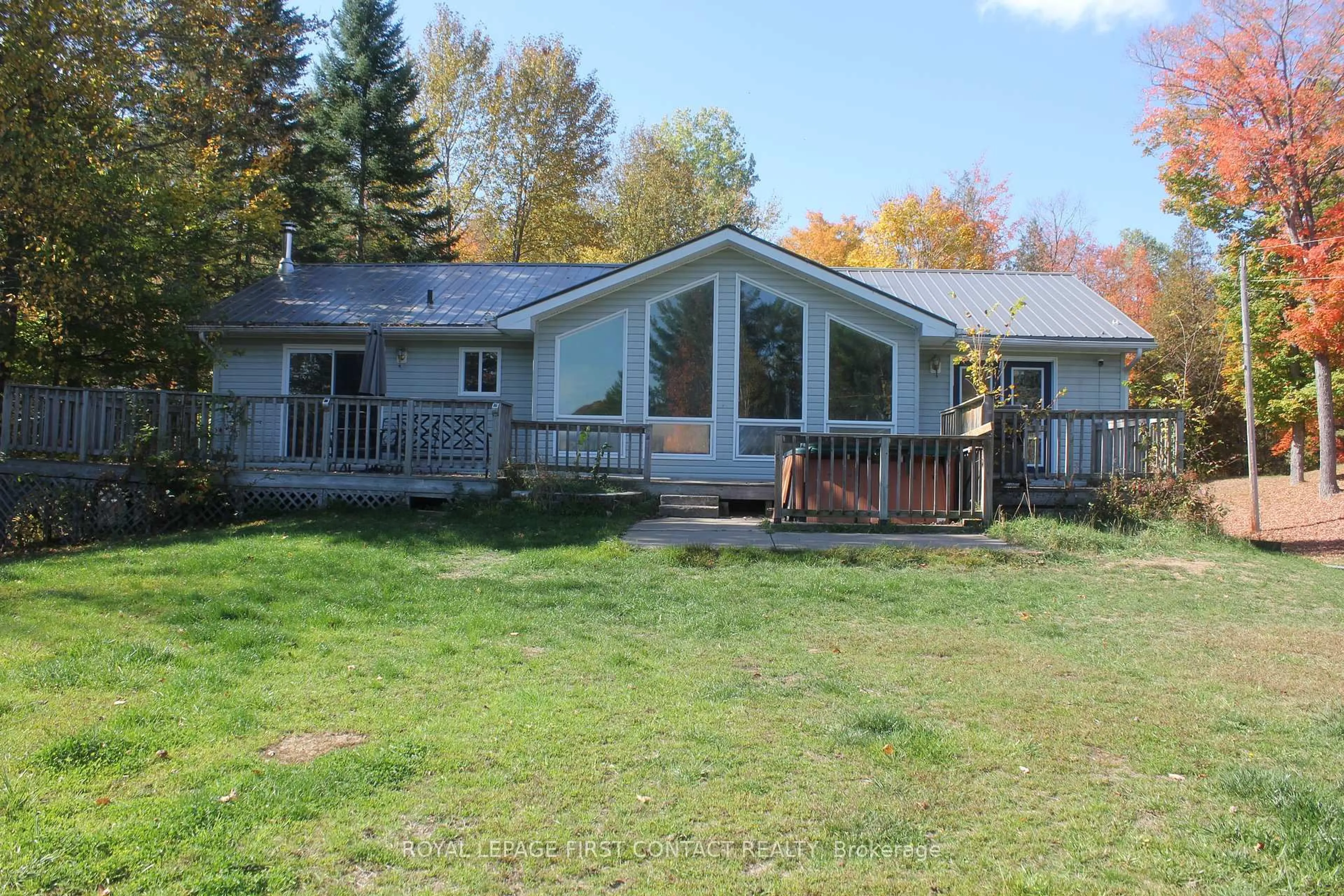 A pic from outside/outdoor area/front of a property/back of a property/a pic from drone, unknown for 12 Birch Pt, Bancroft Ontario K0L 1C0