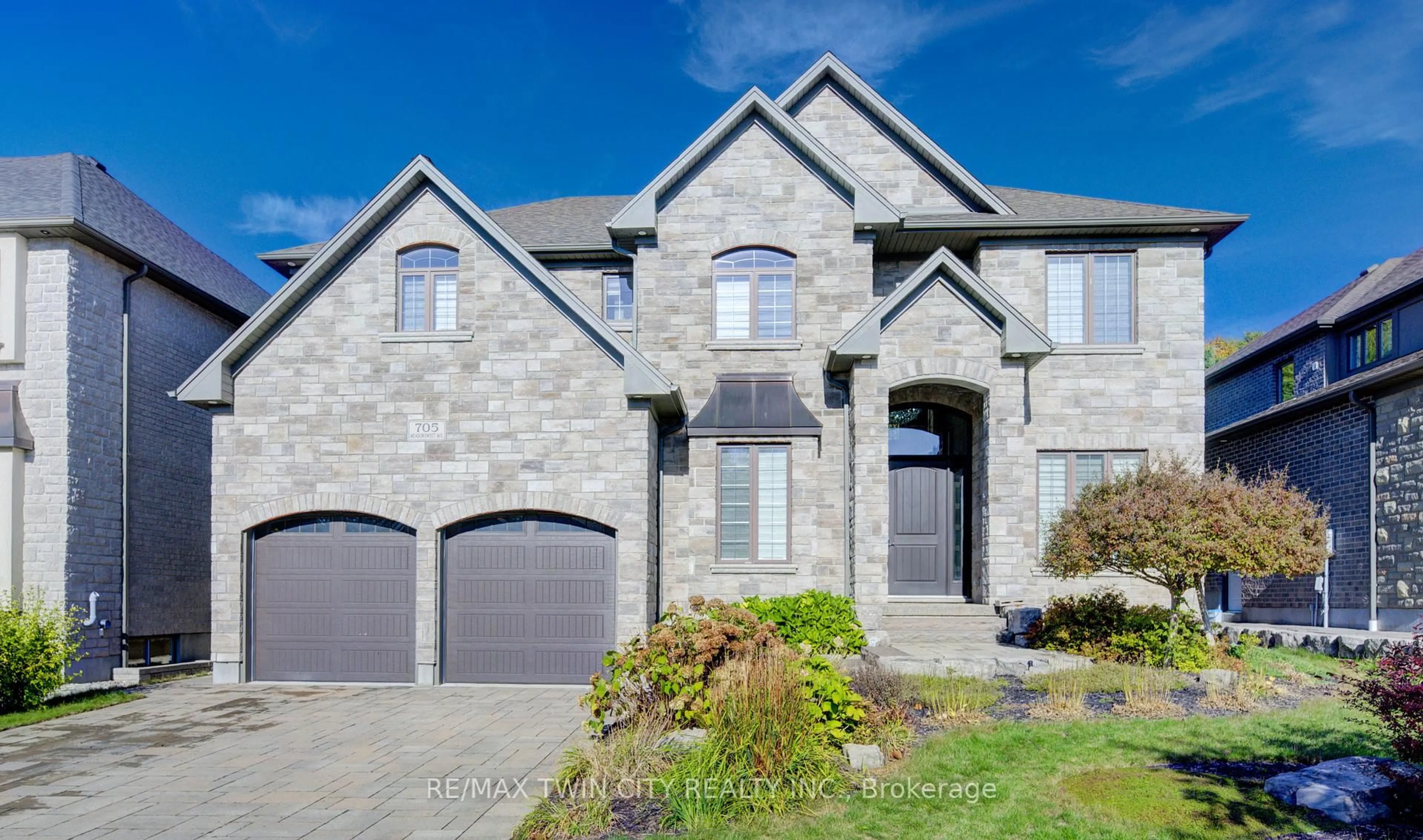 Home with brick exterior material, street for 705 Meadowsweet Ave, Waterloo Ontario N2V 0A7