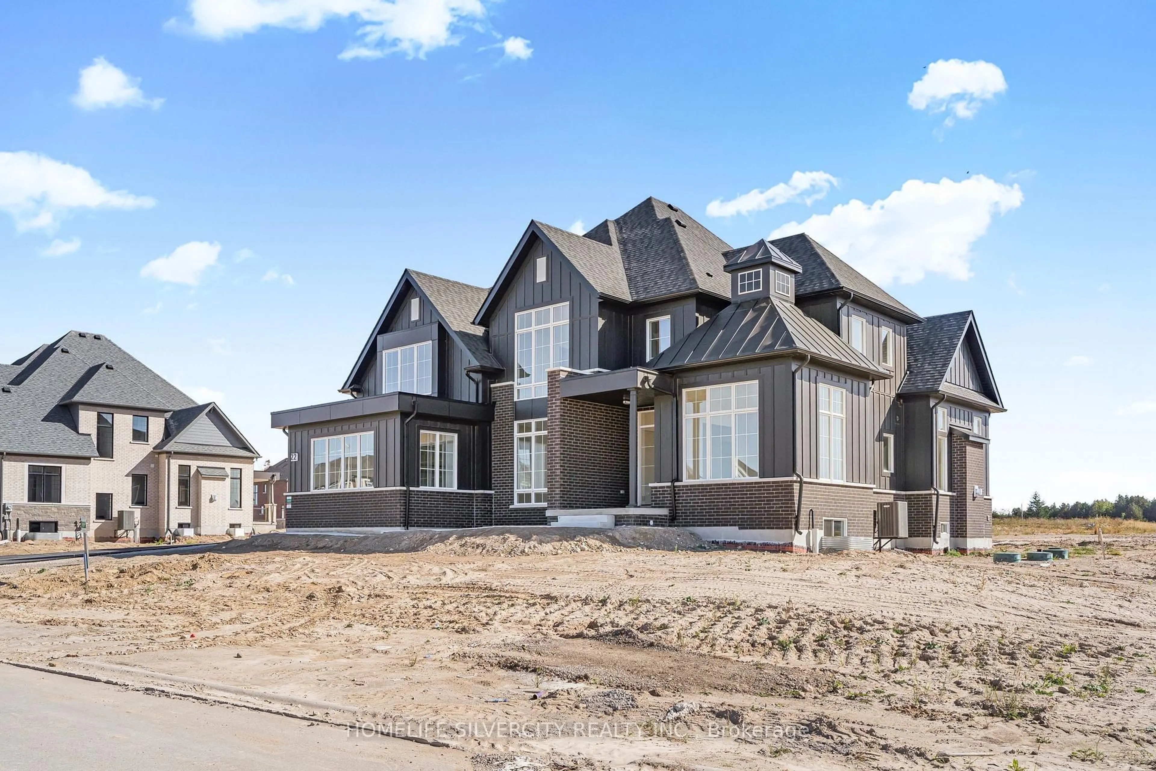 Home with brick exterior material, street for 22 Ewing Way, Amaranth Ontario L9W 5G9