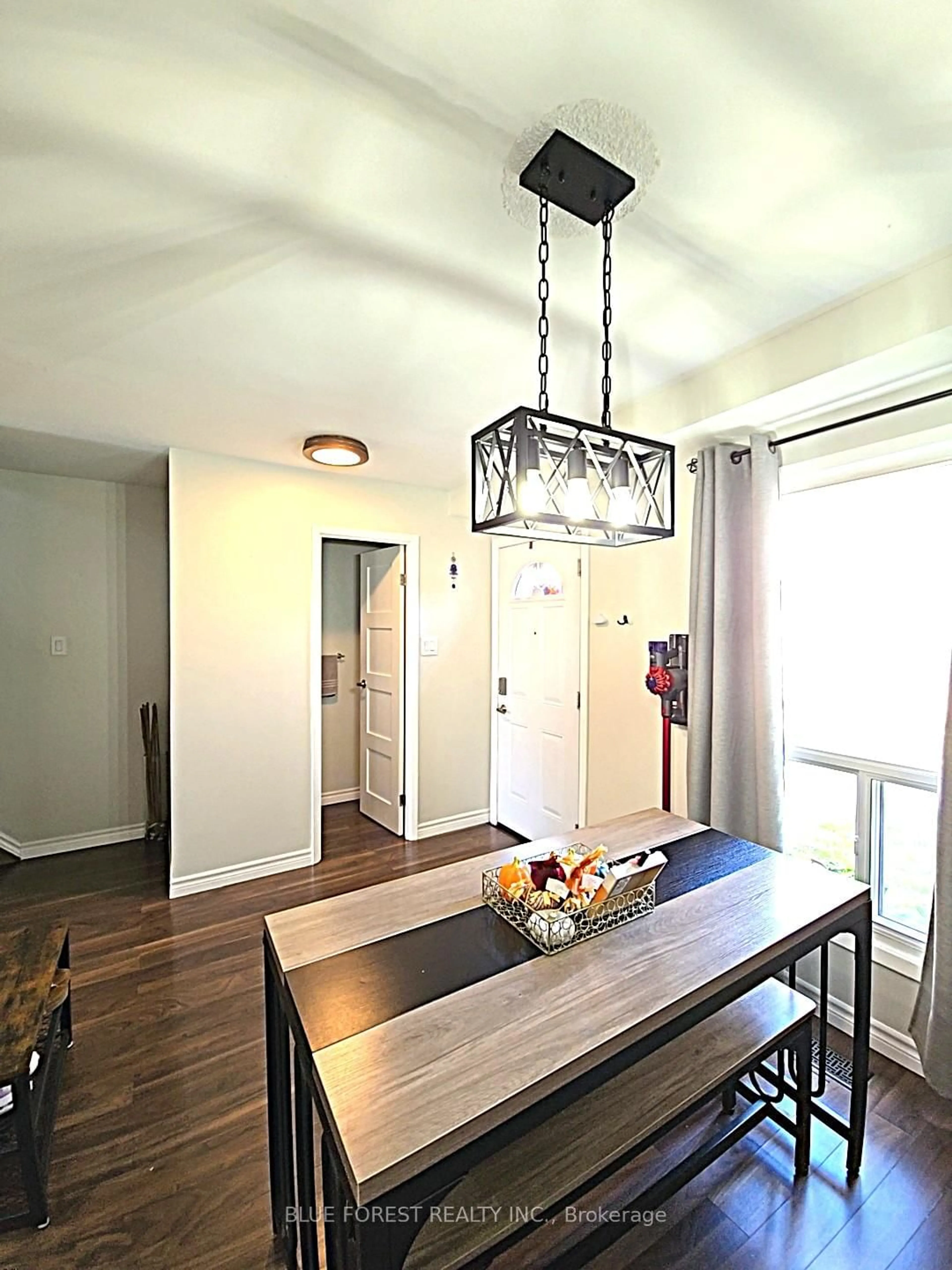 Dining room, wood/laminate floor for 821 Southdale Rd #16, London South Ontario N6E 1V7