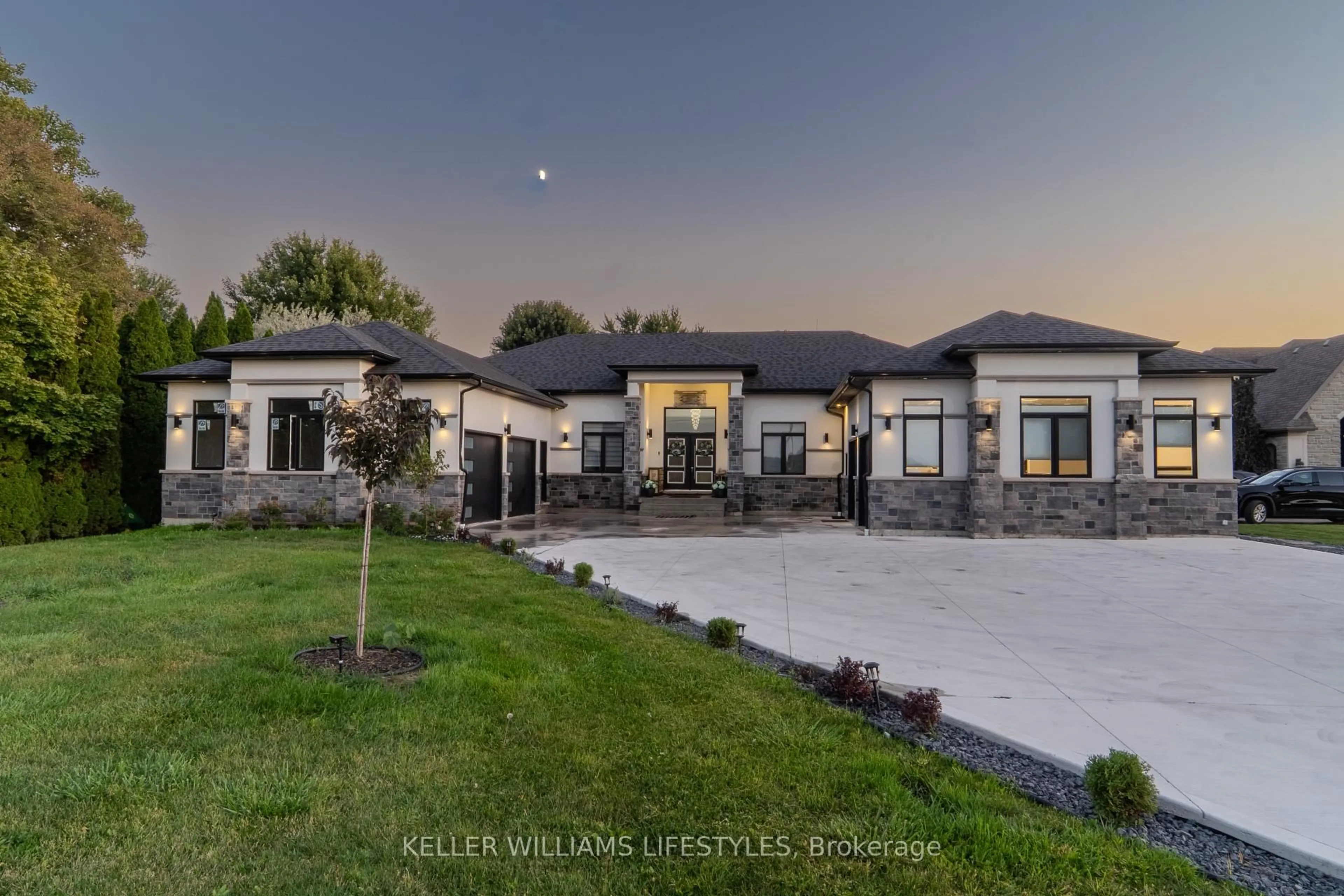 Home with brick exterior material, mountain view for 1316 Deer Run Rd, Leamington Ontario N8H 3V7