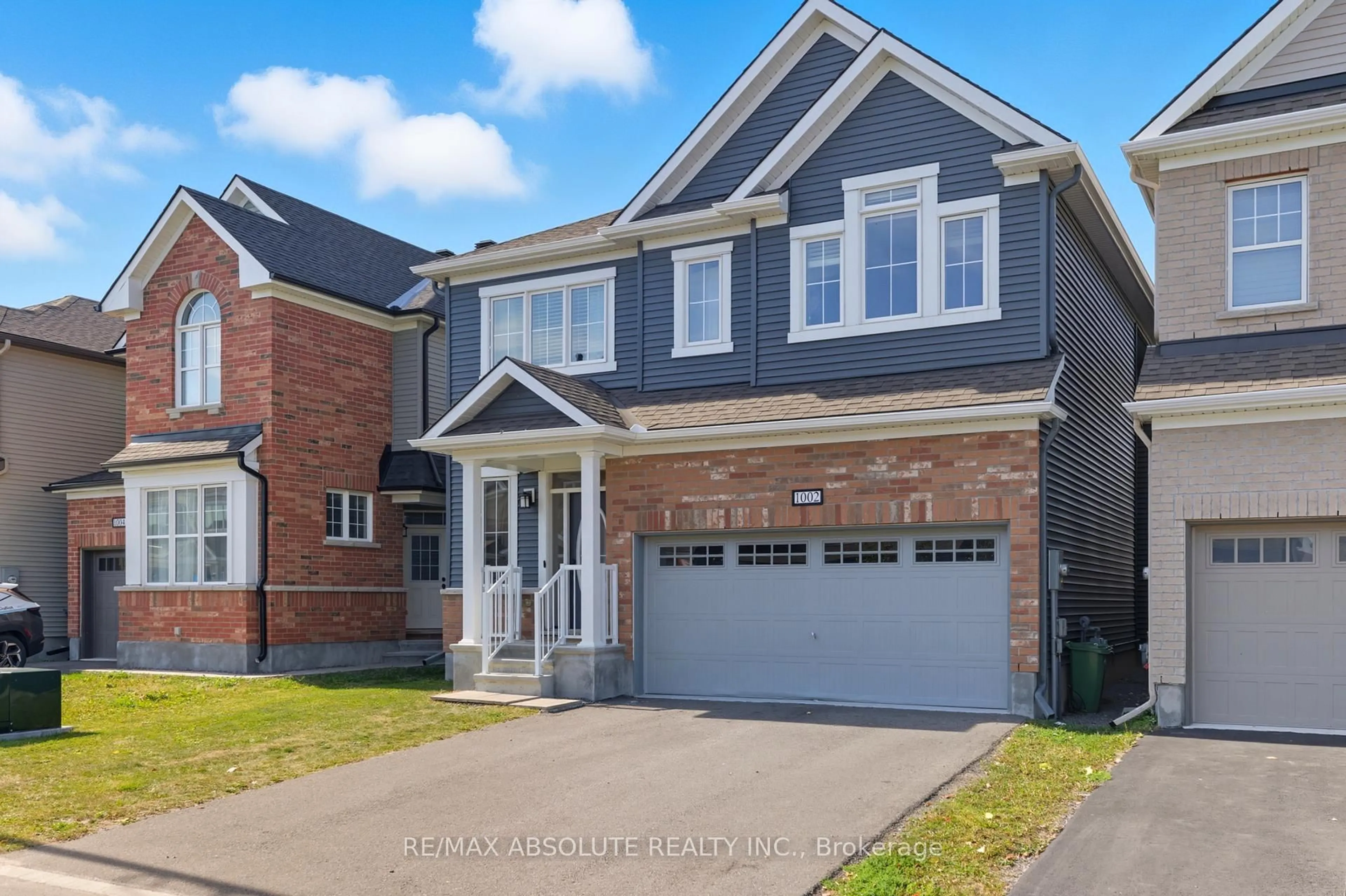 Home with brick exterior material, street for 1002 Cottontail Walk, Ottawa Ontario K1G 3H1