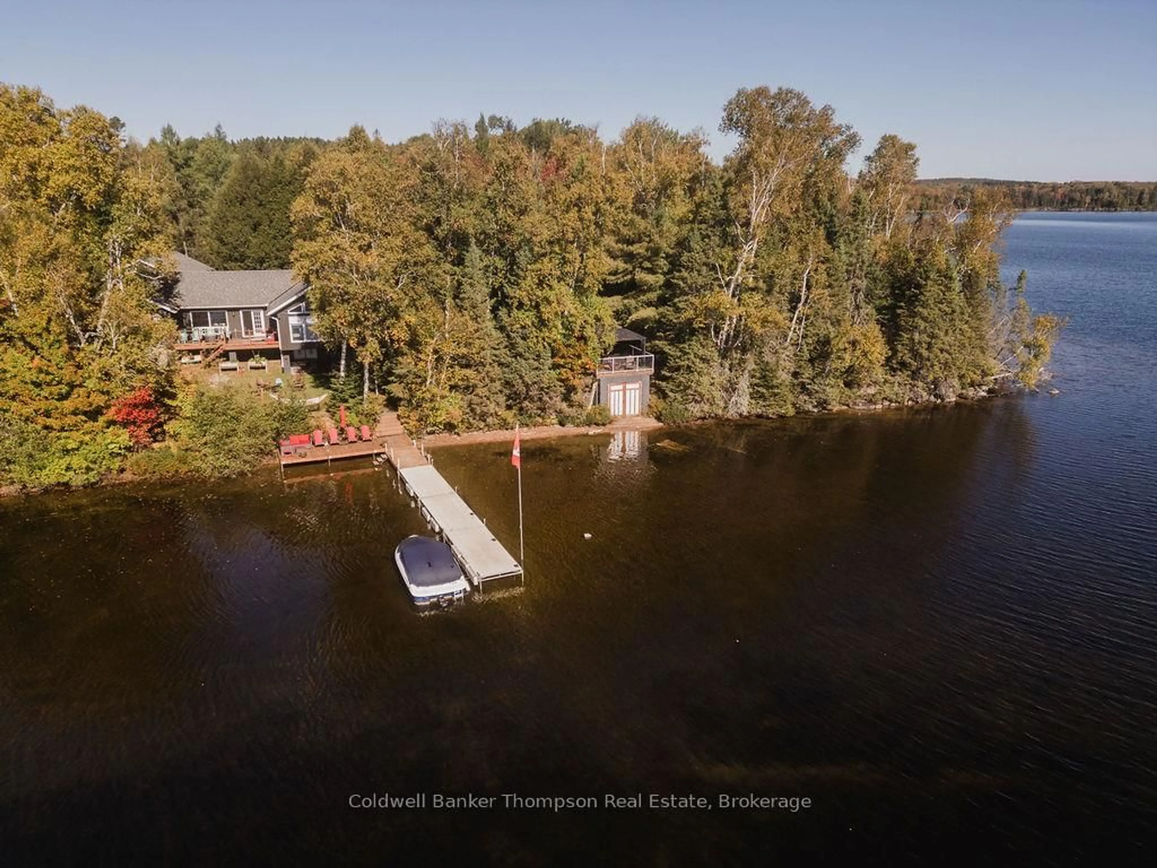 A pic from outside/outdoor area/front of a property/back of a property/a pic from drone, water/lake/river/ocean view for 47 Machar Cres, Machar Ontario P0A 1X0