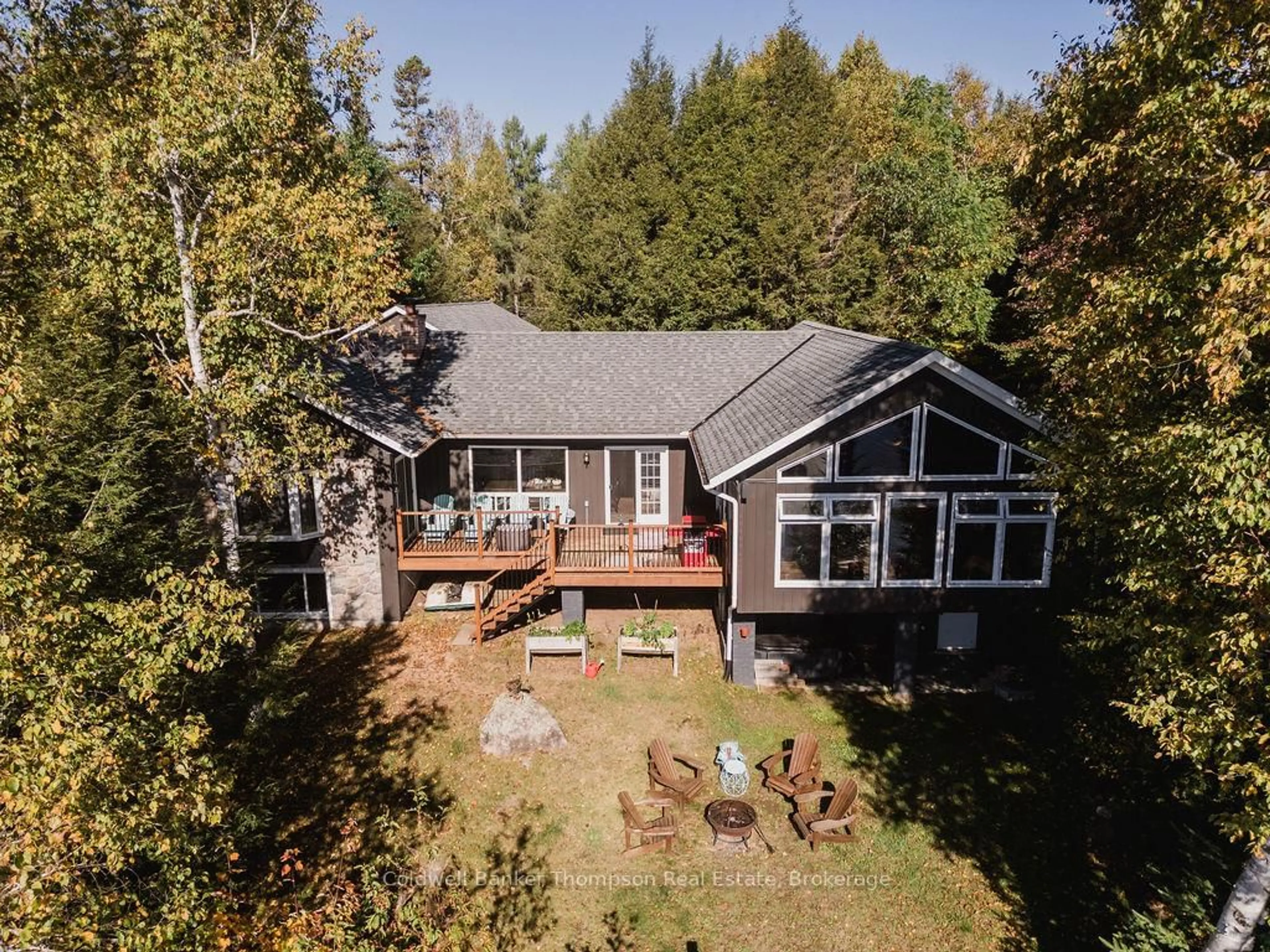 A pic from outside/outdoor area/front of a property/back of a property/a pic from drone, water/lake/river/ocean view for 47 Machar Cres, Machar Ontario P0A 1X0
